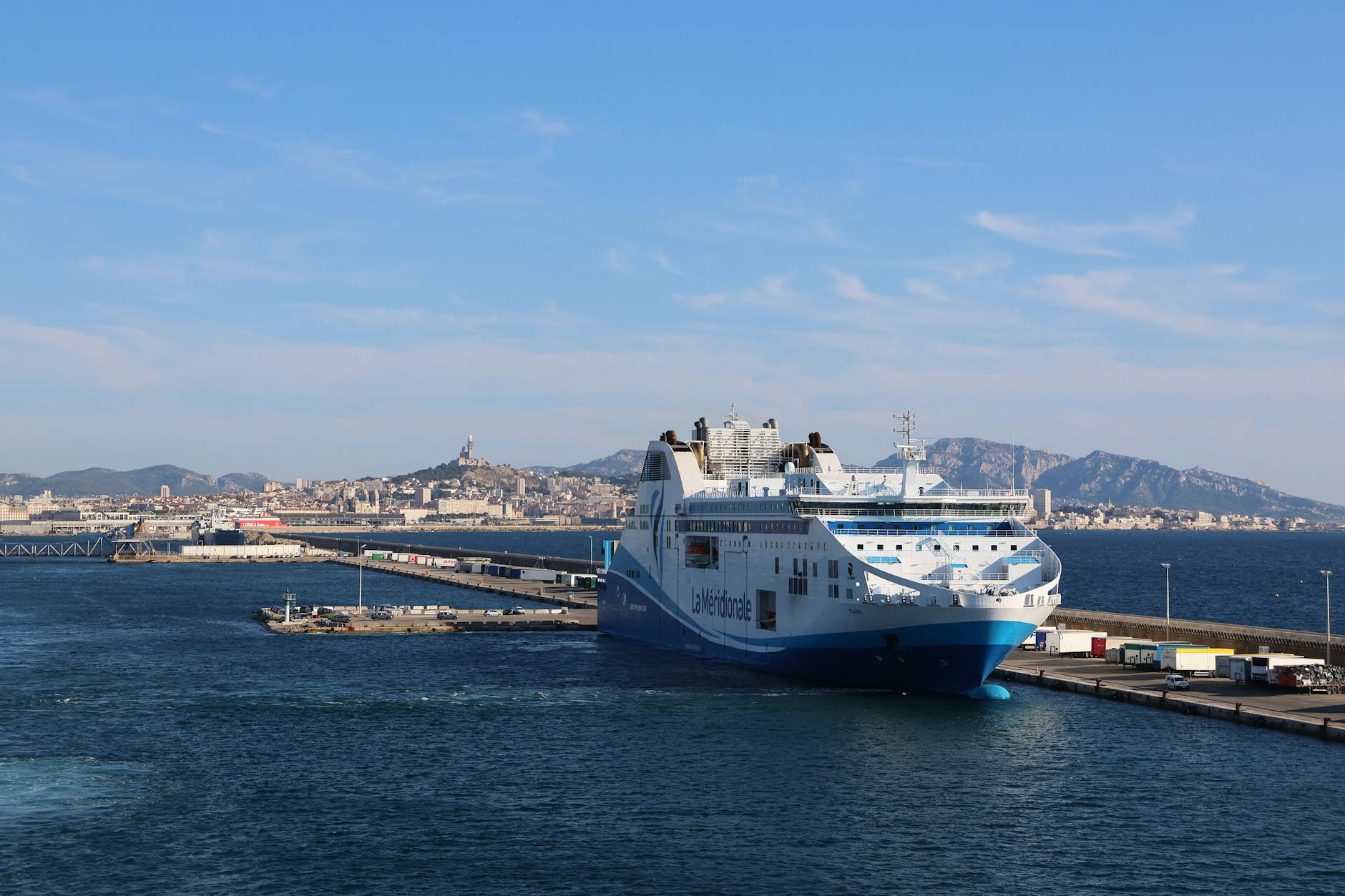 Large ferry ship docked at Marseille harbor.