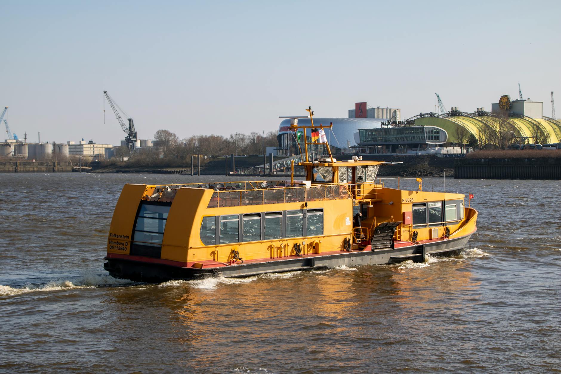 Yellow ferry on the Elbe River in Hamburg.