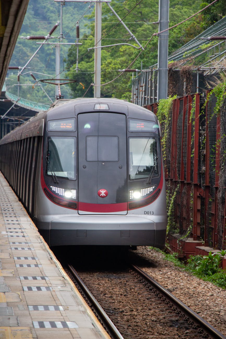 Modern train arriving at a station in Hong Kong.