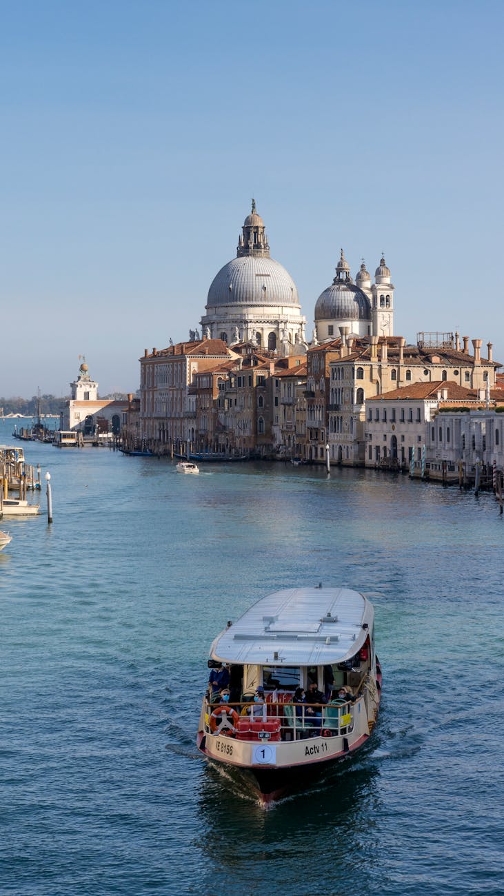 Vaporetto moving along the Grand Canal in Venice.