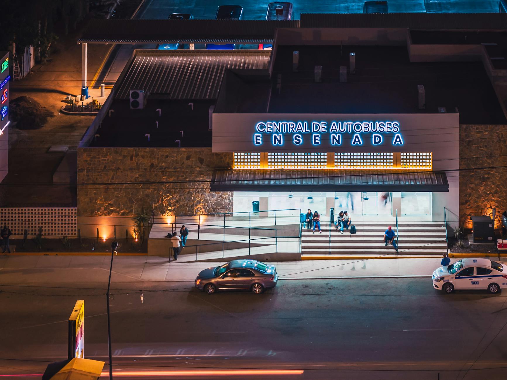 Central de Autobuses Ensenada at night.