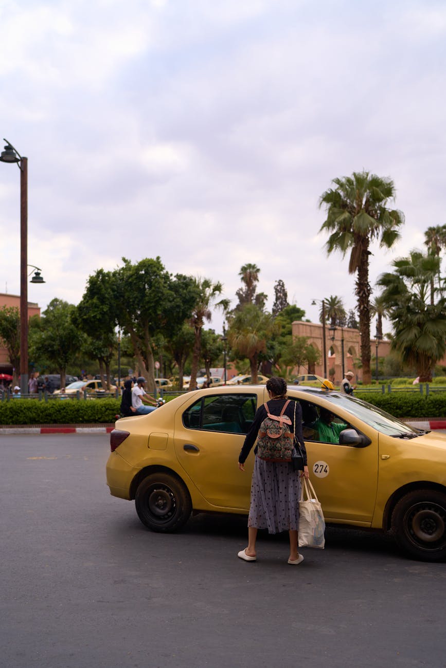 Yellow taxi on a street in Marrakesh.