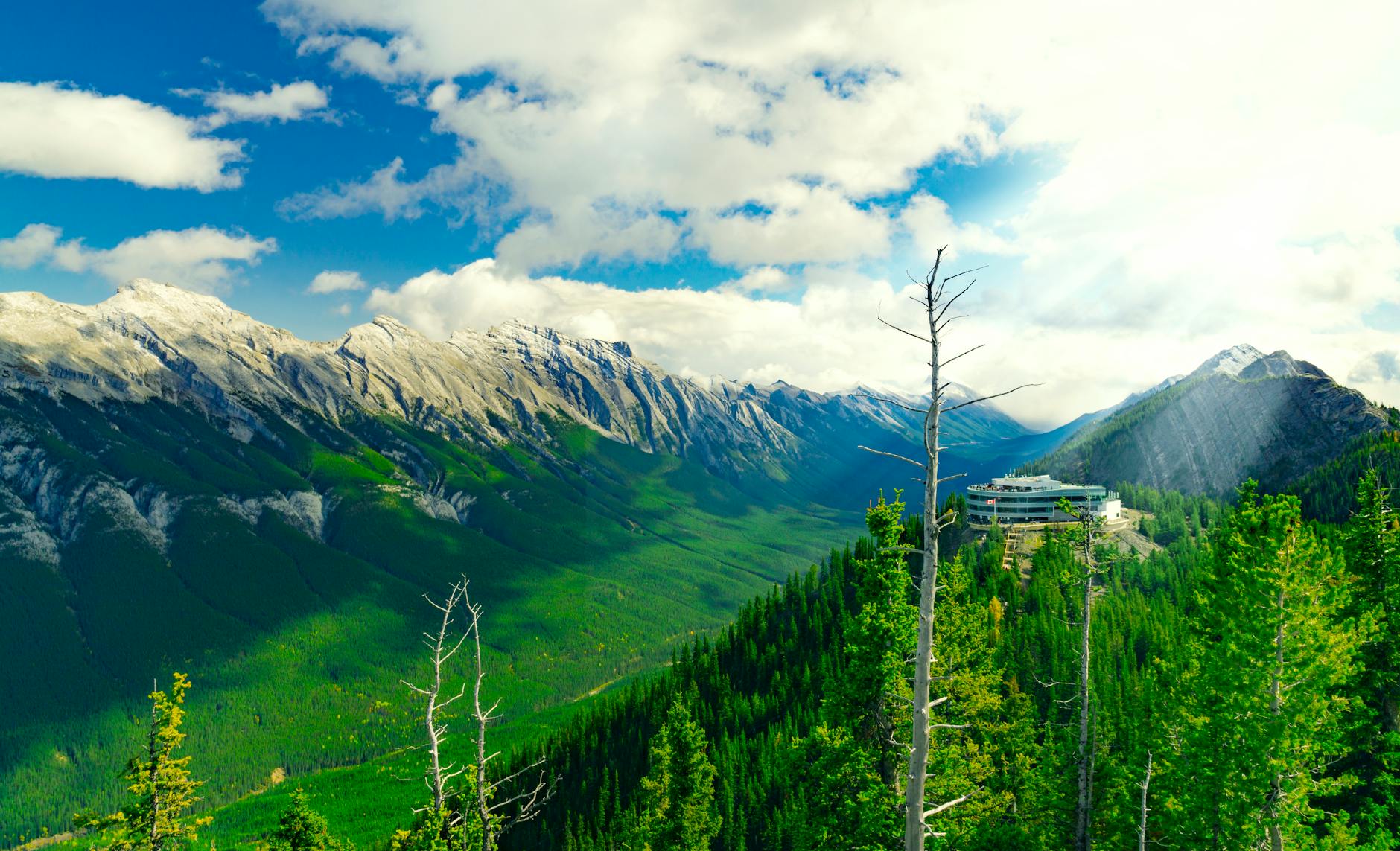 Expansive mountain view from Sulphur Mountain in Banff, offering breathtaking natural scenery.