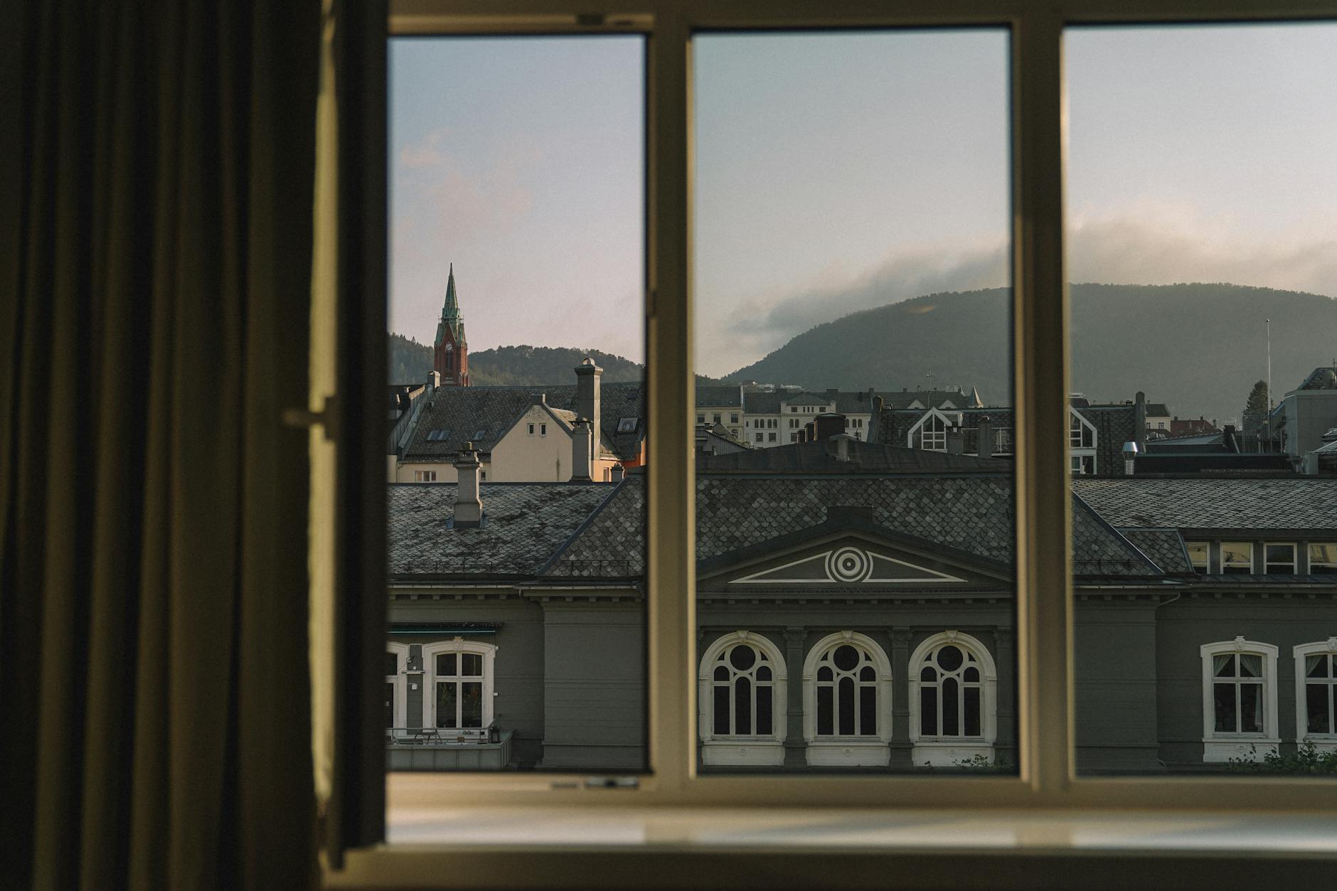 Bergen rooftops from a window for conference venue geography planning.