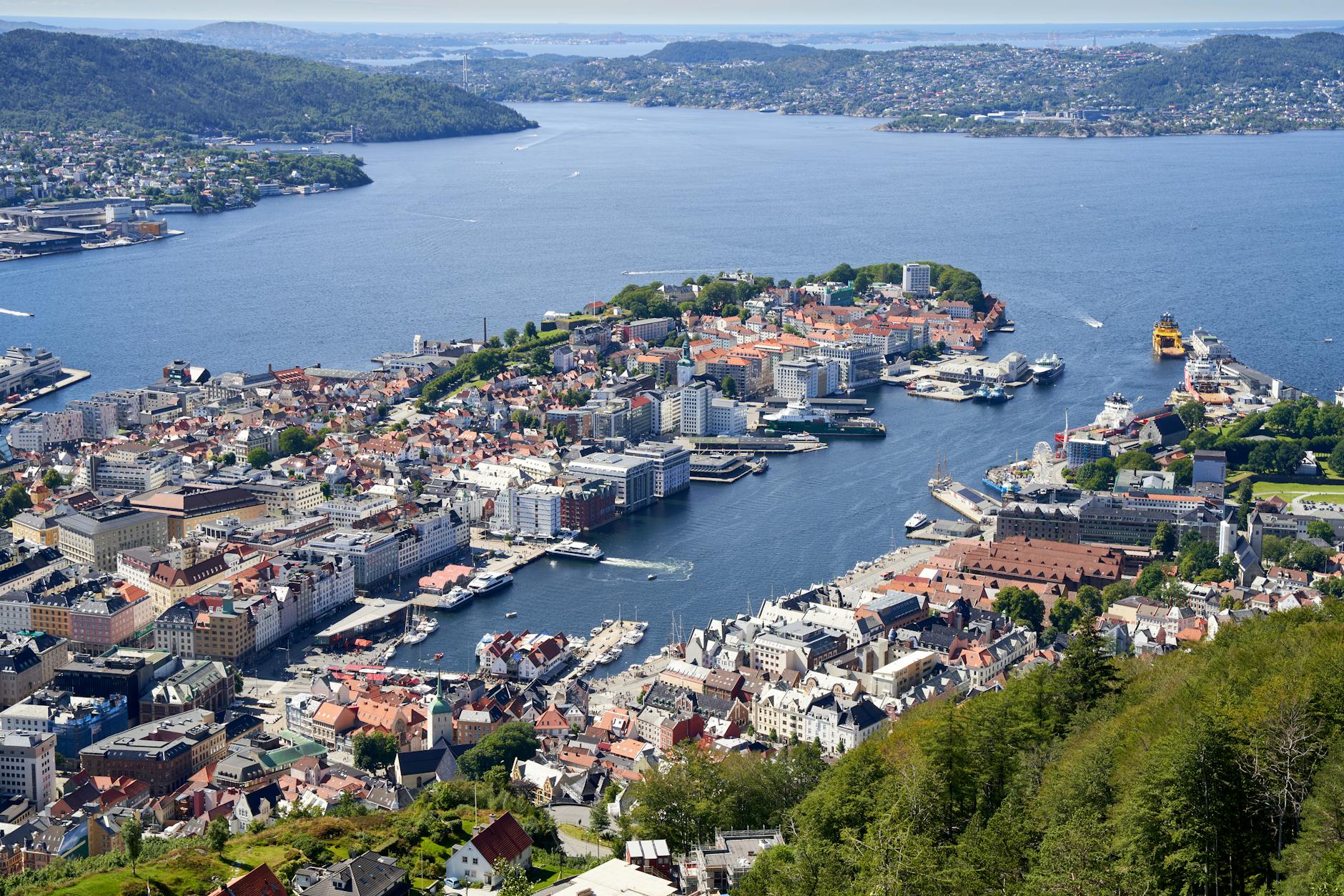 Aerial Bergen harbor and surrounding fjords for consultant arrival planning.