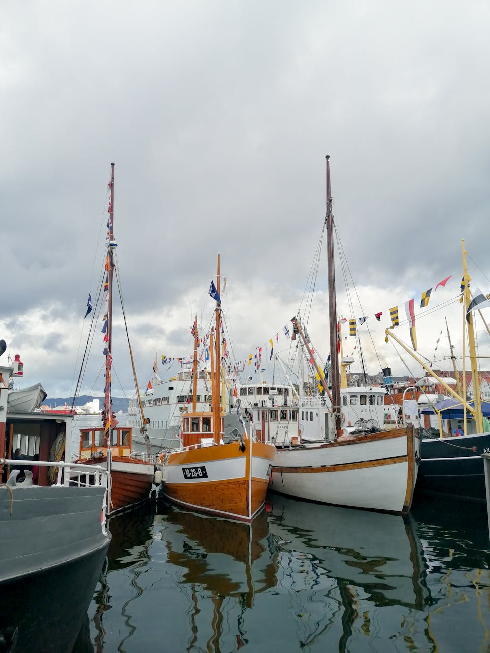 Sailboats in Bergen harbor for practical port-call planning.
