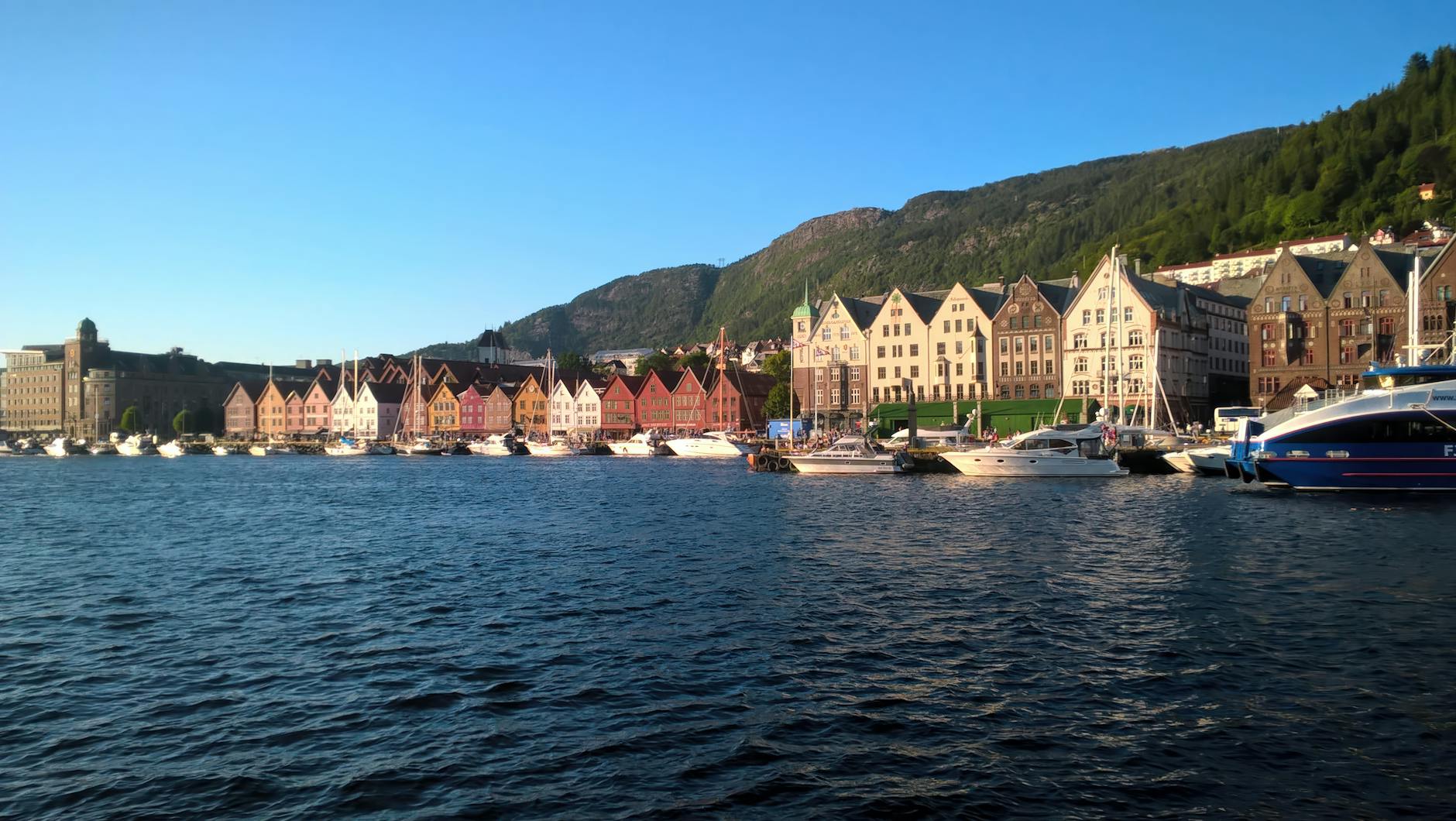 Pastel Bergen harborfront houses for family evening planning.