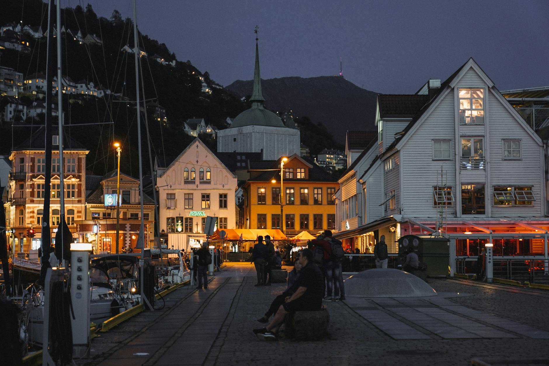 Evening Bergen harbor area for luxury hotel base planning.