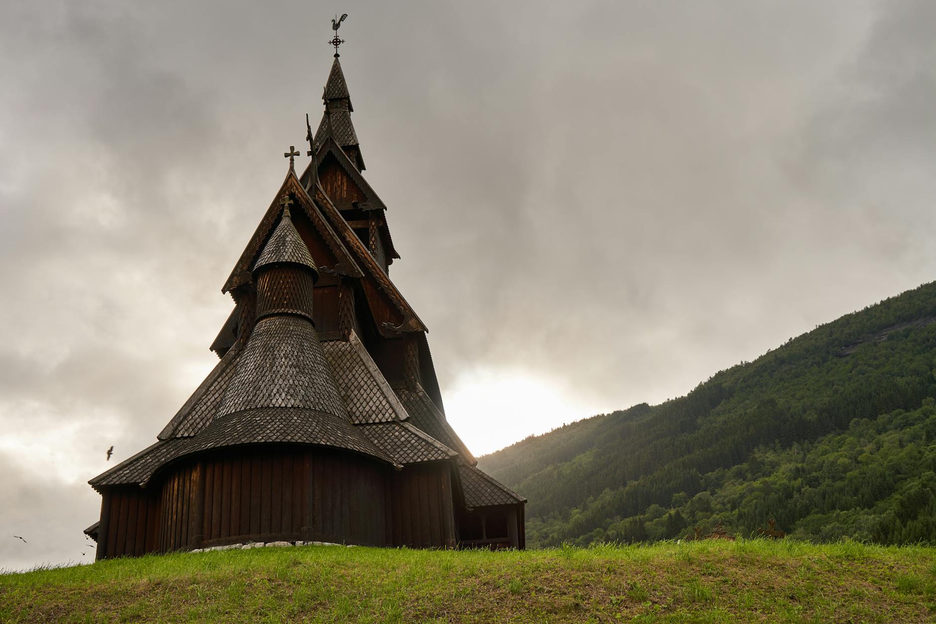 Medieval stave church exterior for group and accessibility planning.