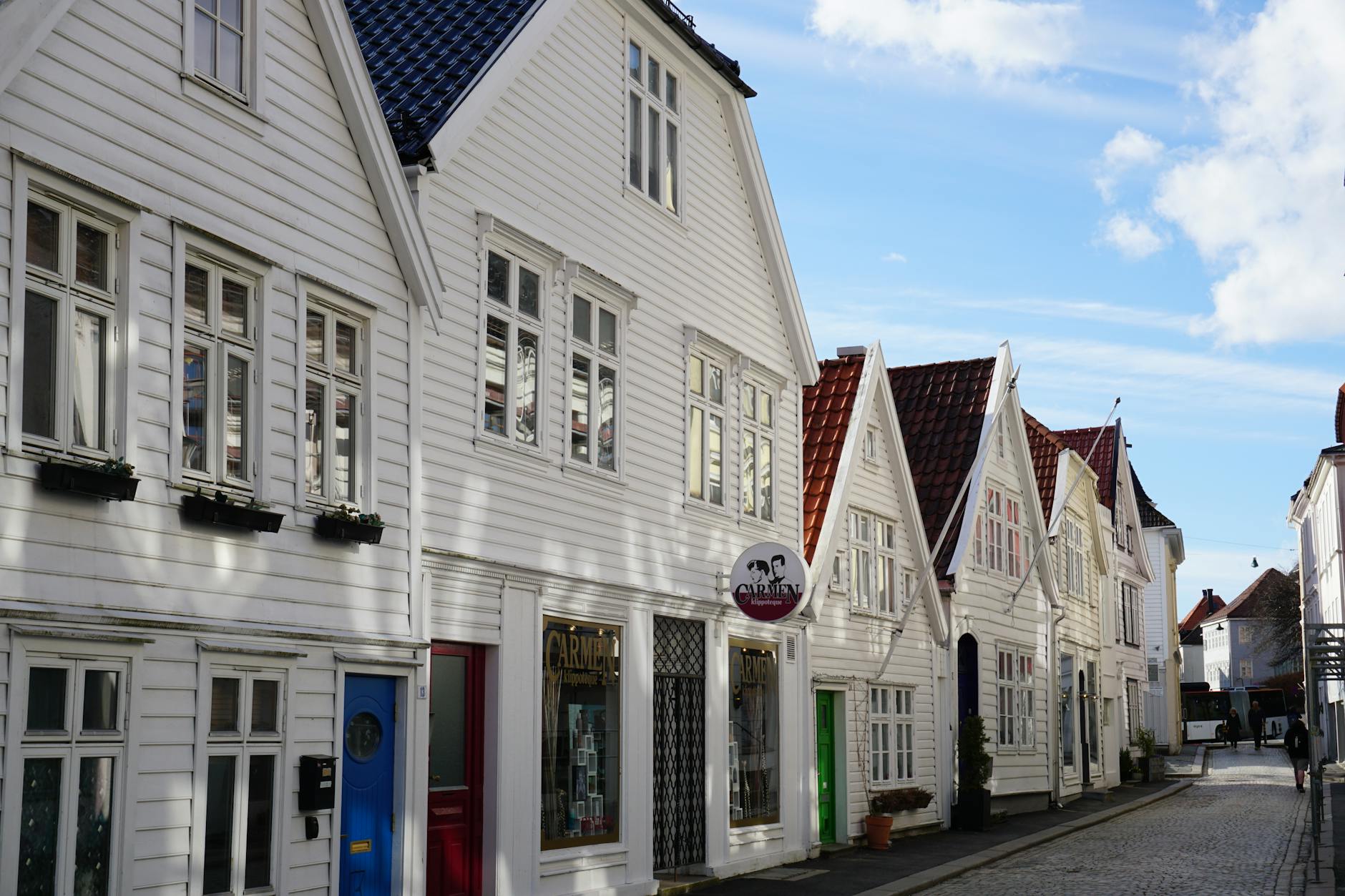 Wooden Bergen houses for repeat visitor lodging planning.