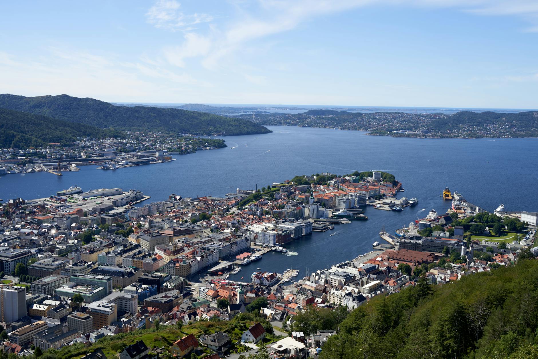 Aerial Bergen city and harbor for repeat leisure report planning.