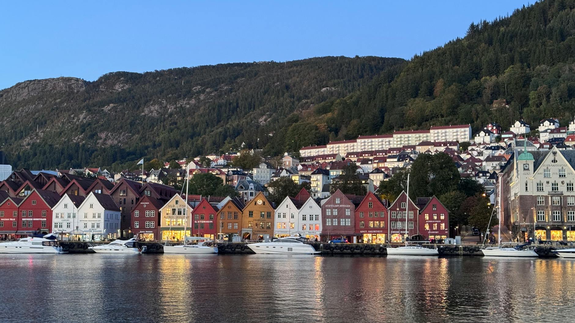 Bergen Bryggen at dusk for solo evening return planning.