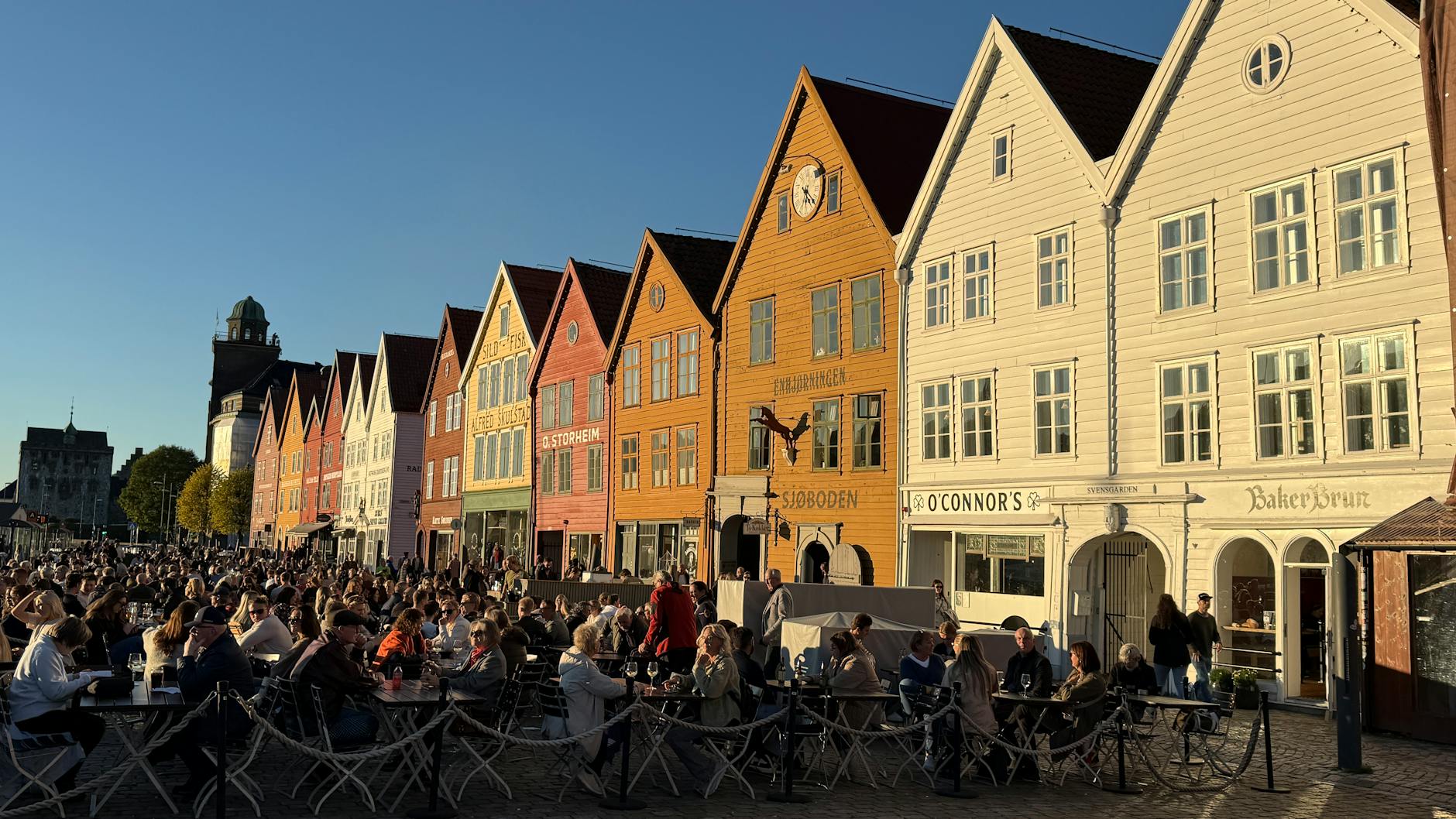 Busy Bryggen area for solo Bergen meal planning.