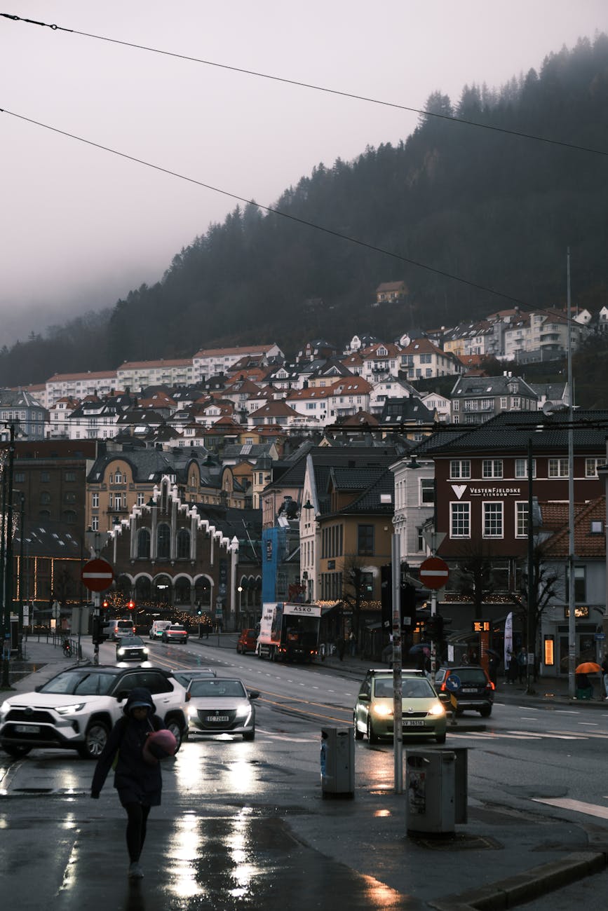 Rainy Bergen street for luggage and stopover planning.