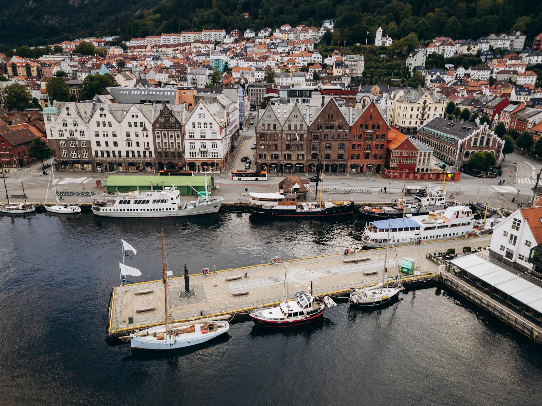 Aerial view of Bryggen and Bergen harbor for medical-constraints travel planning.