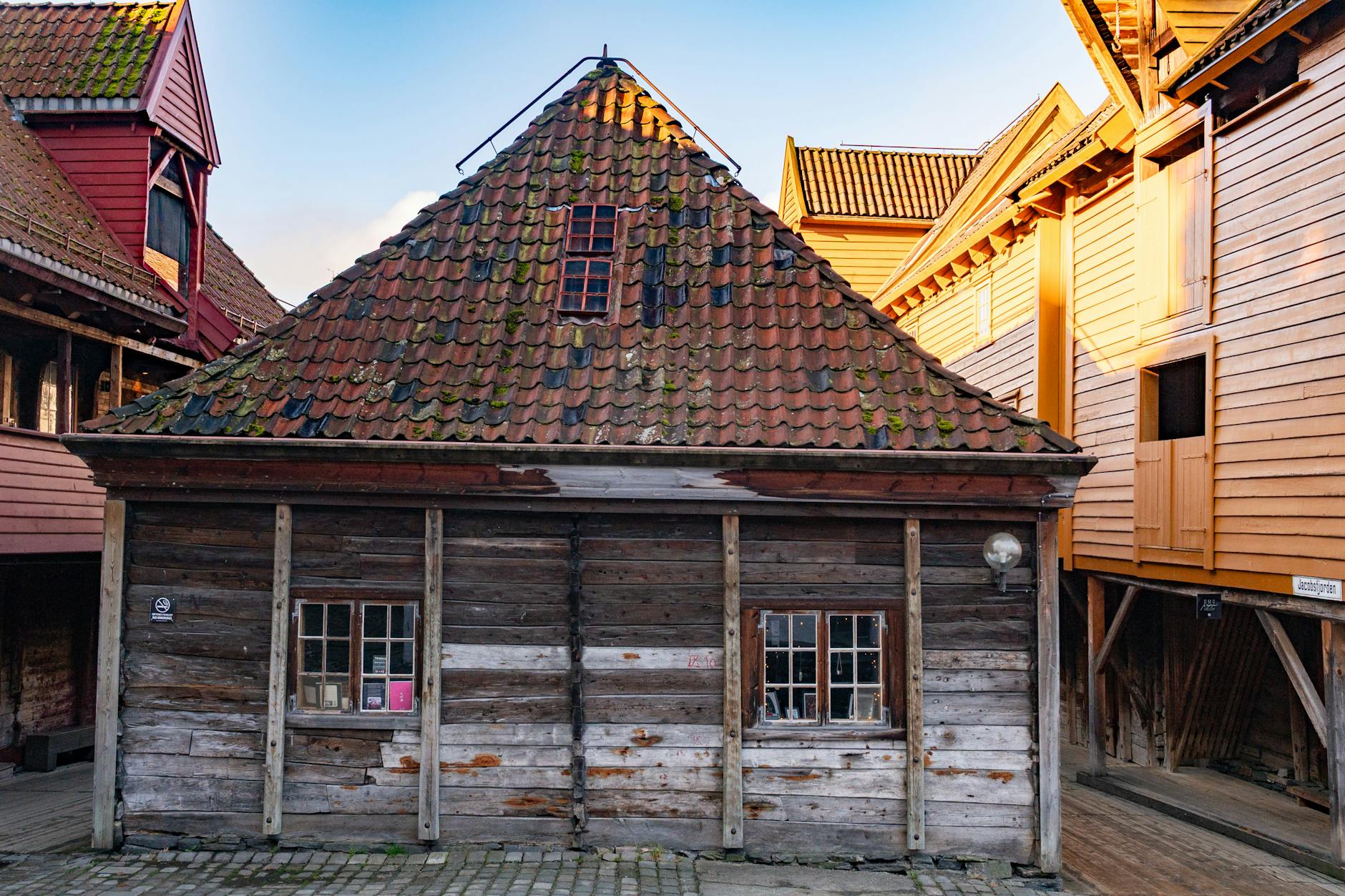 Historic wooden building at Bryggen for Bergen surface planning.