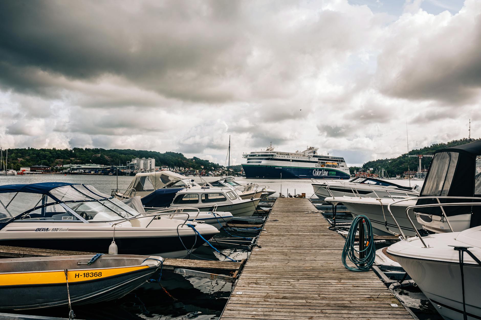 Boats in Bergen harbor for local partner movement planning.