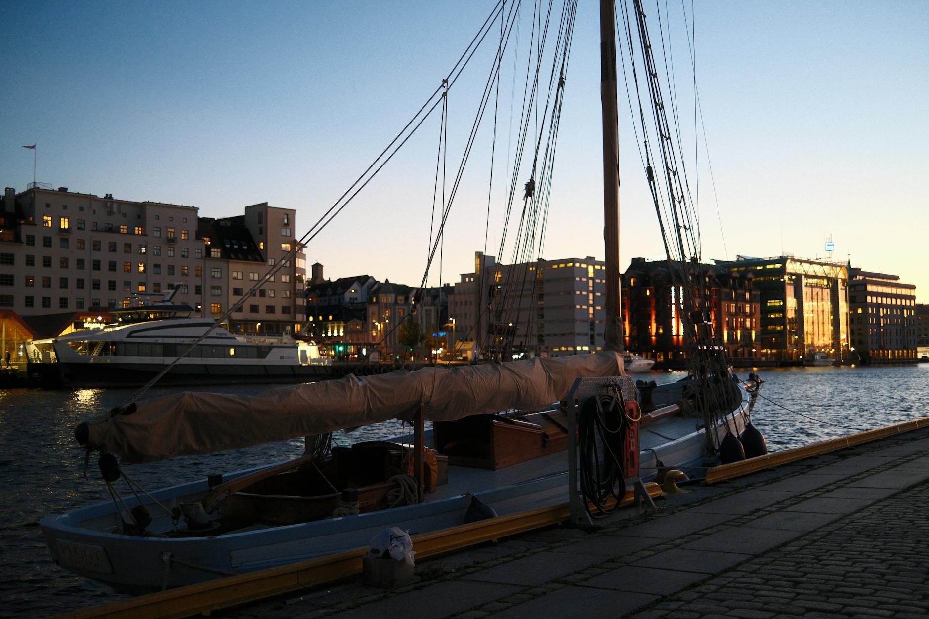 Twilight Bergen harbor for transport and check-in planning.