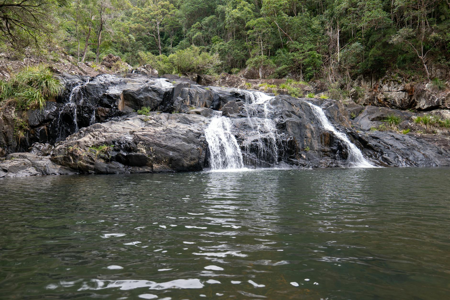 Queensland forest waterfall for Brisbane outdoor gear planning.