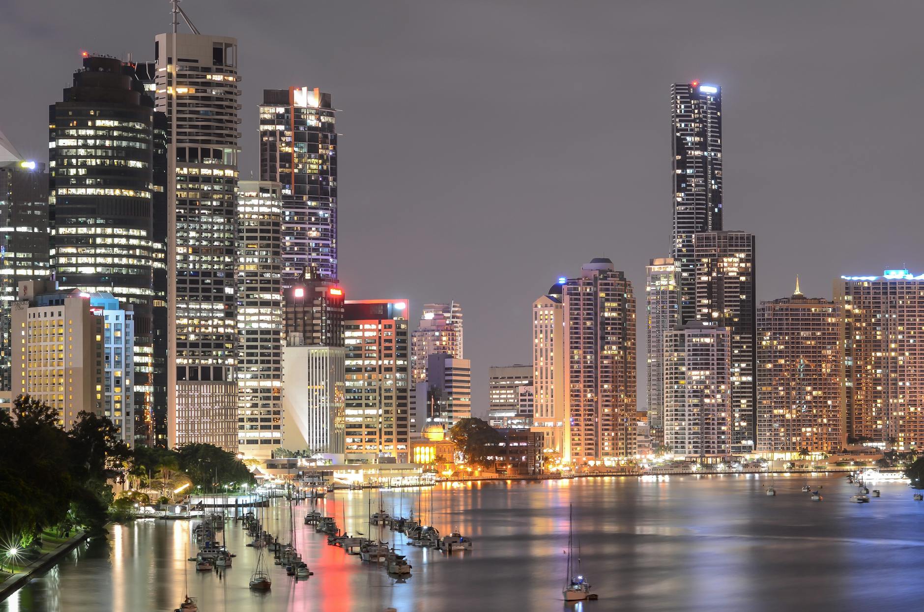 Brisbane skyline at night for remote work and recovery planning.