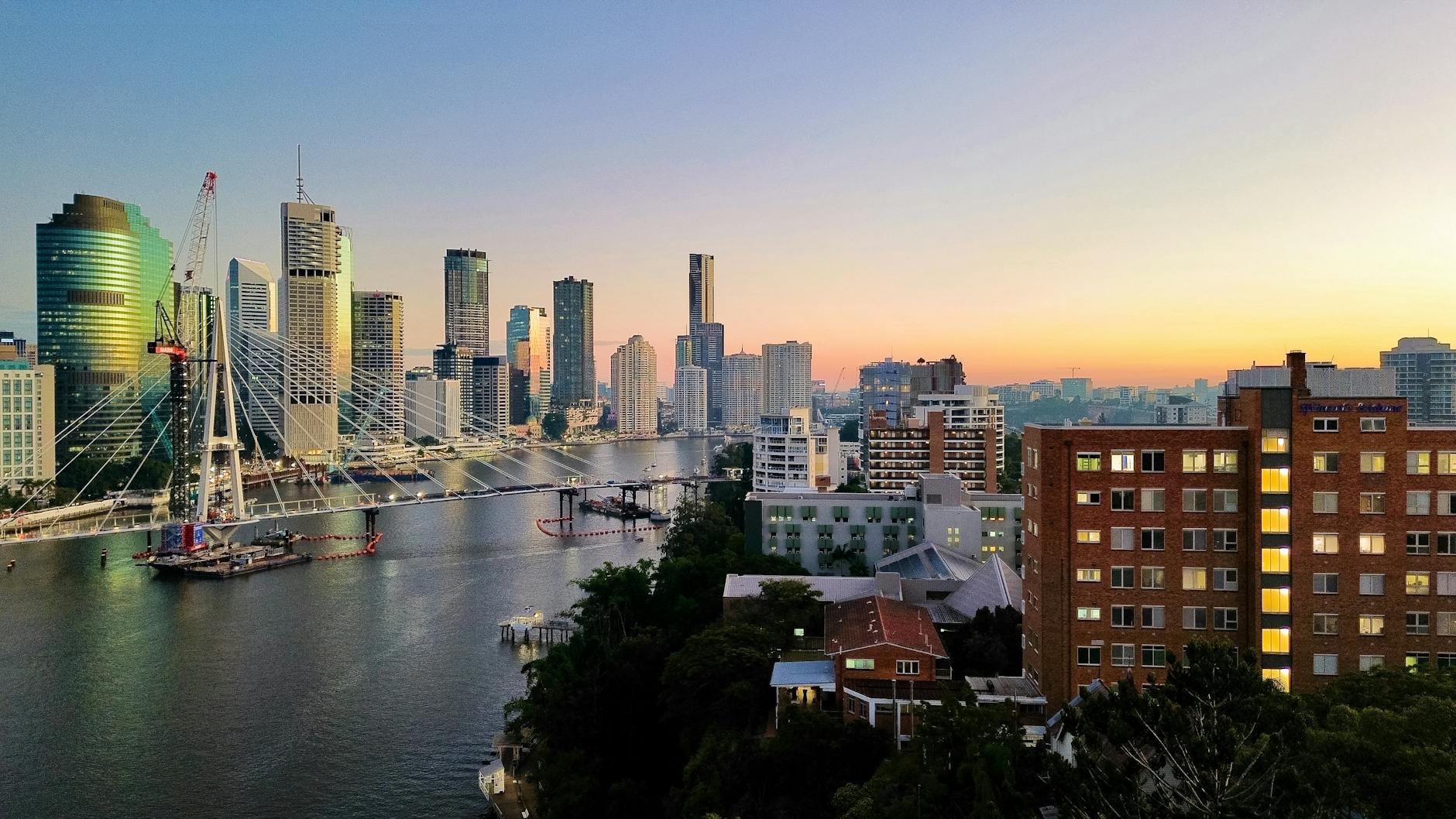 Brisbane skyline at sunset for weather-aware business planning.