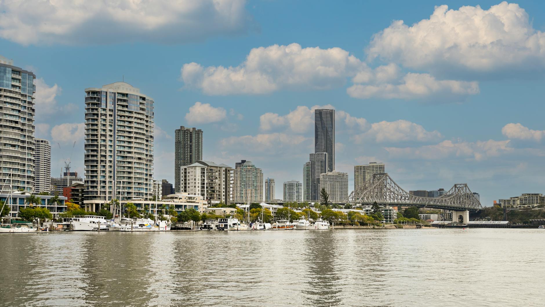 Brisbane skyline and Story Bridge for business hotel area planning.