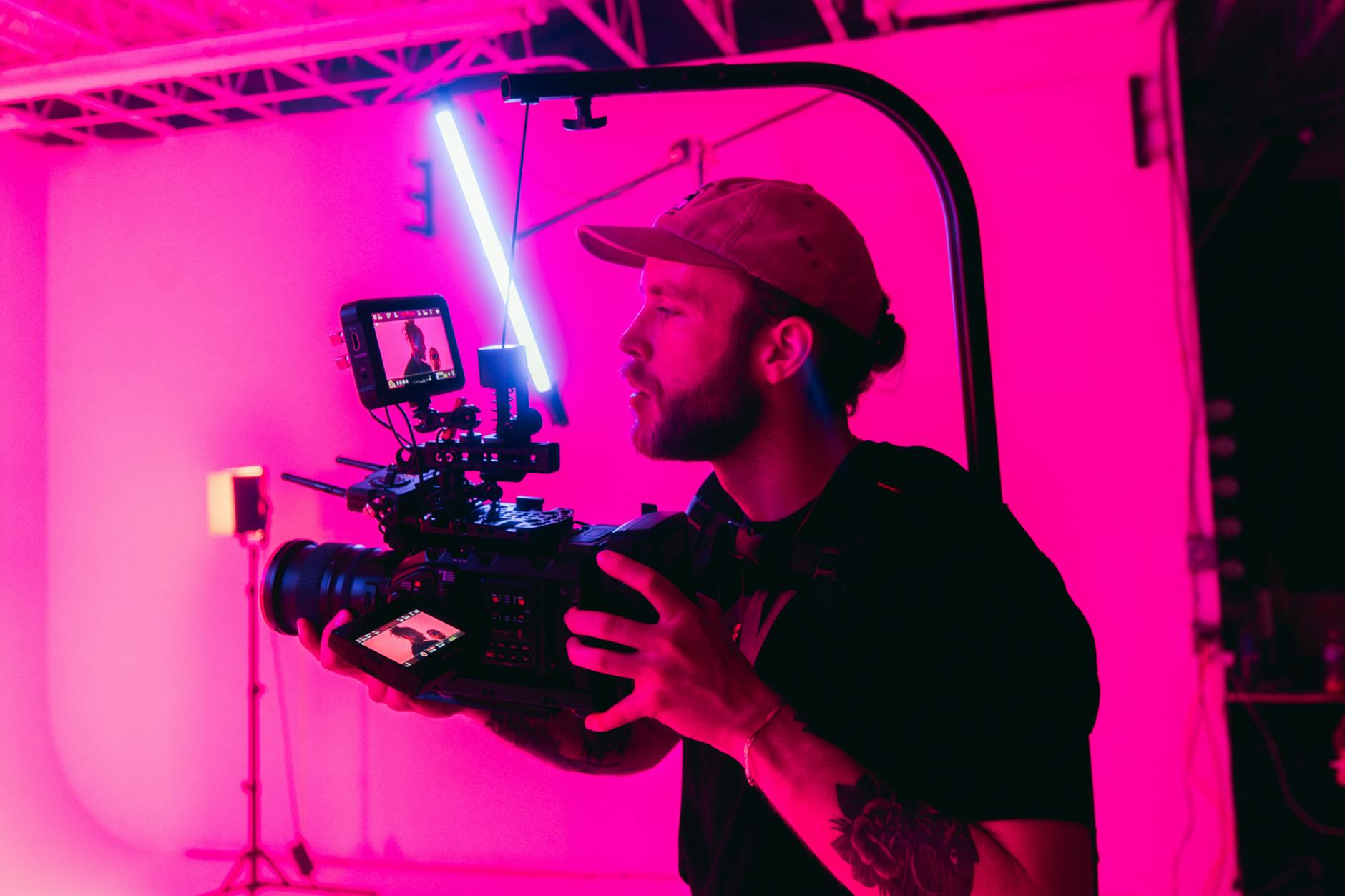 Videographer with professional camera for Brisbane gear planning.