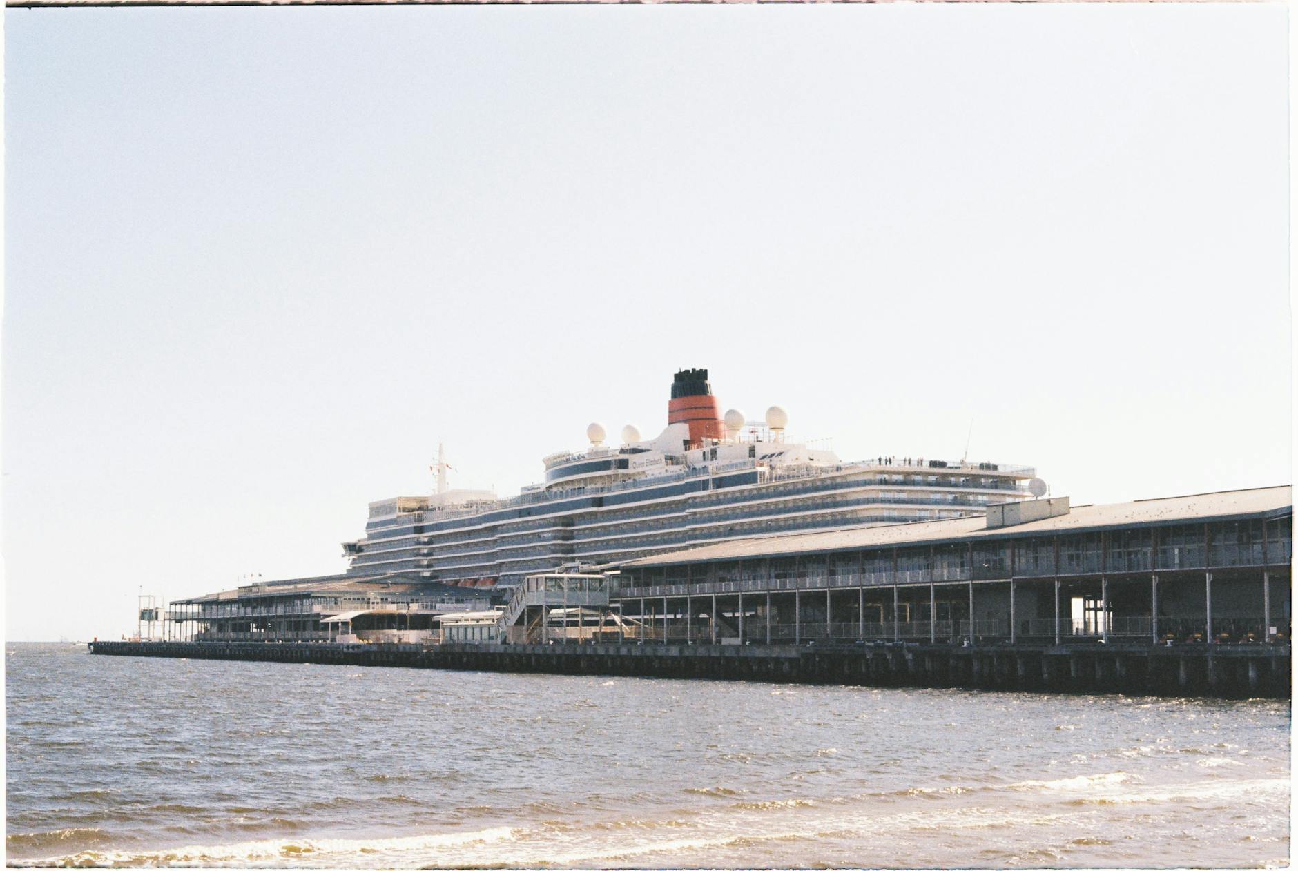 Cruise ship docked at an Australian port for Brisbane shore-day planning.