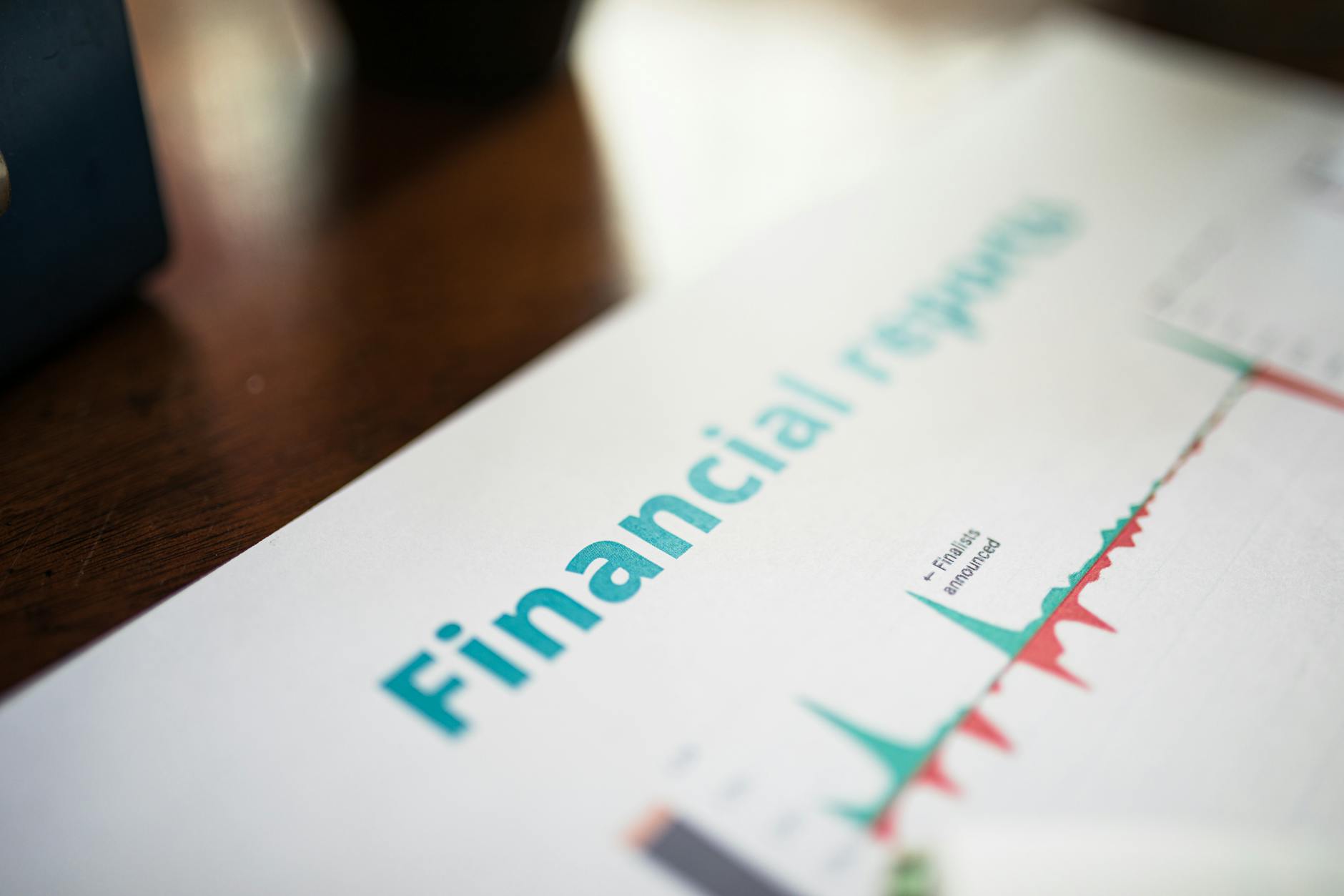 Financial report close-up for Brisbane investor review blocks.