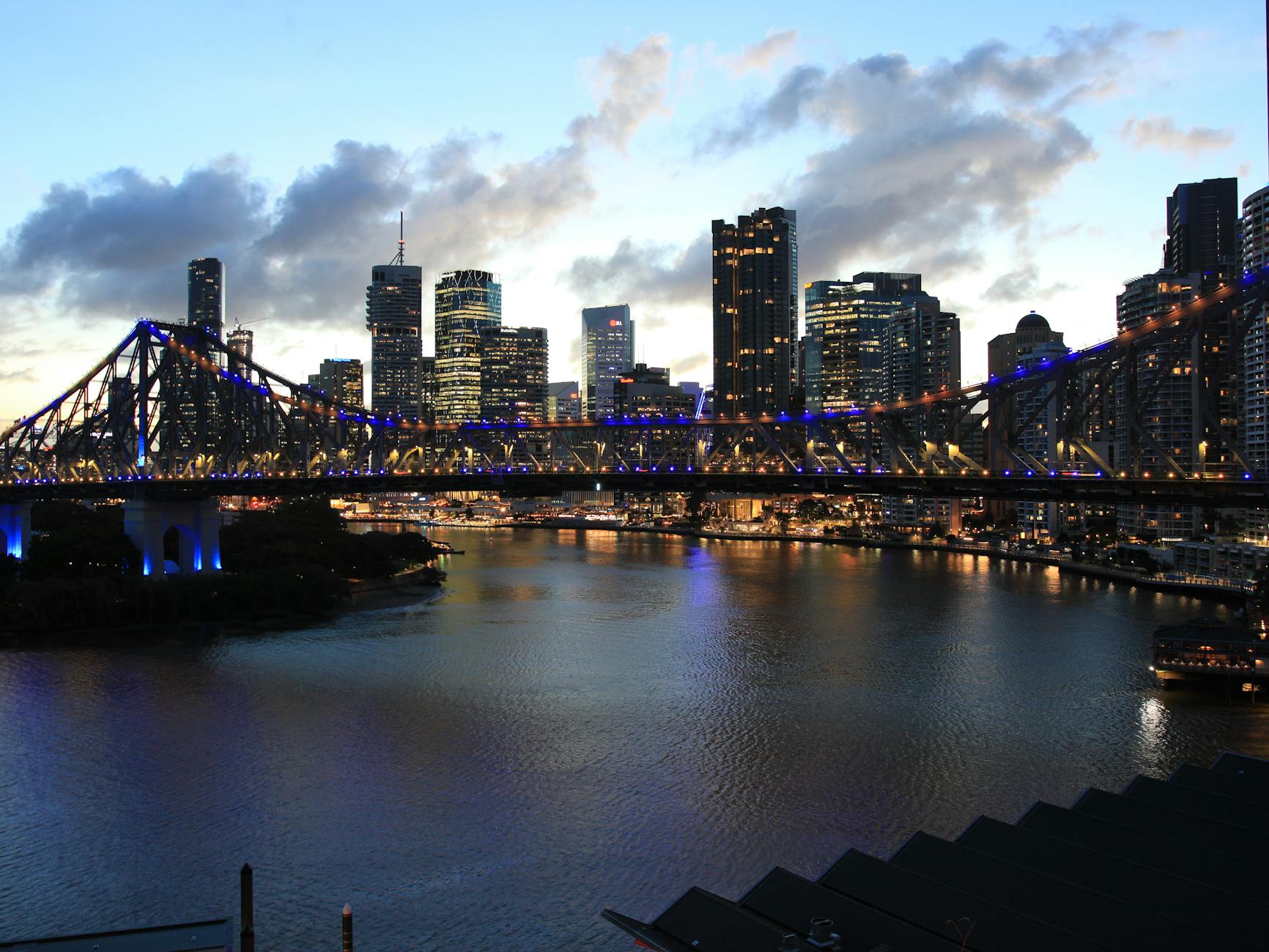 Brisbane Story Bridge at twilight for luxury evening pacing.