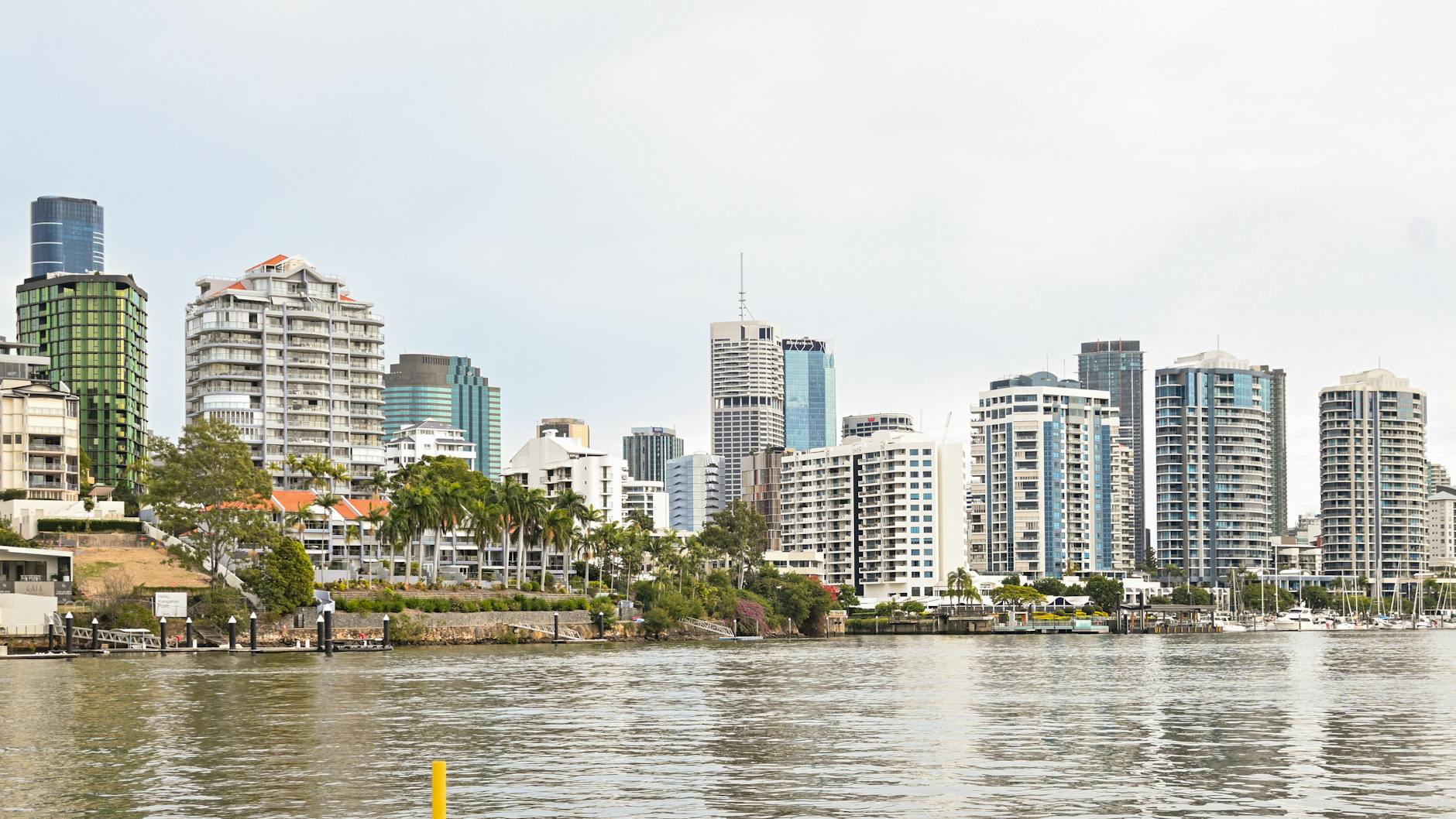 Brisbane riverfront skyline for meal and restroom route planning.