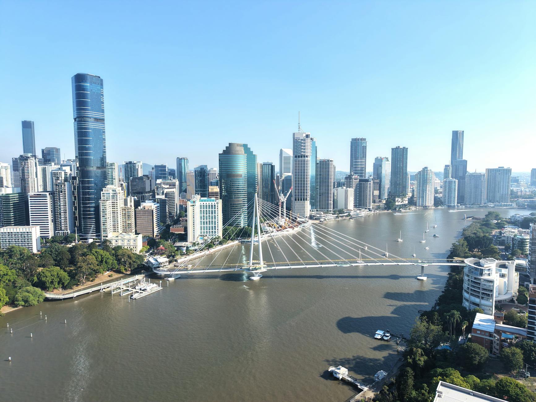 Aerial Brisbane river and skyline for gentle sightseeing anchor planning.