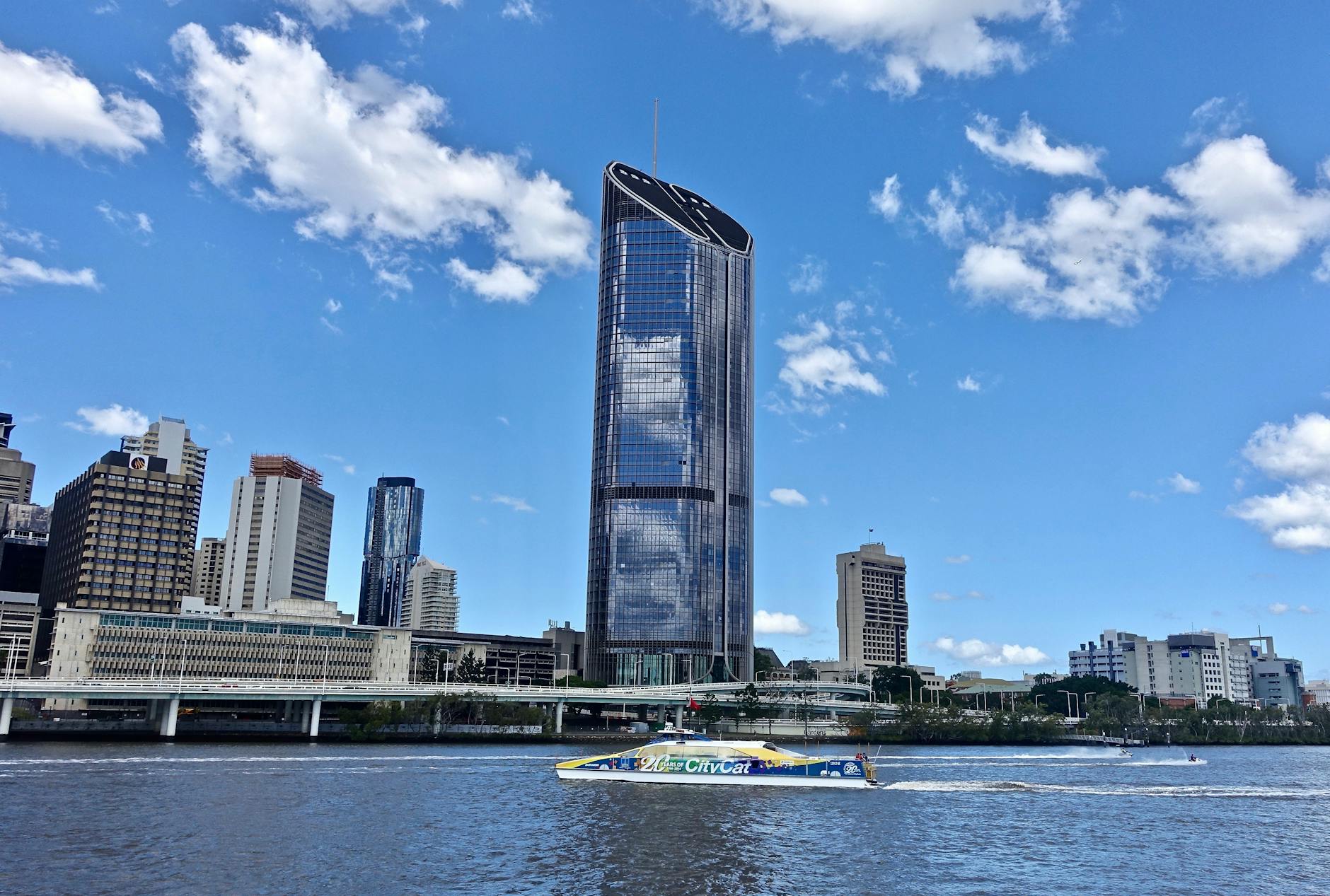 Brisbane skyline reflected in the river for older traveler planning.