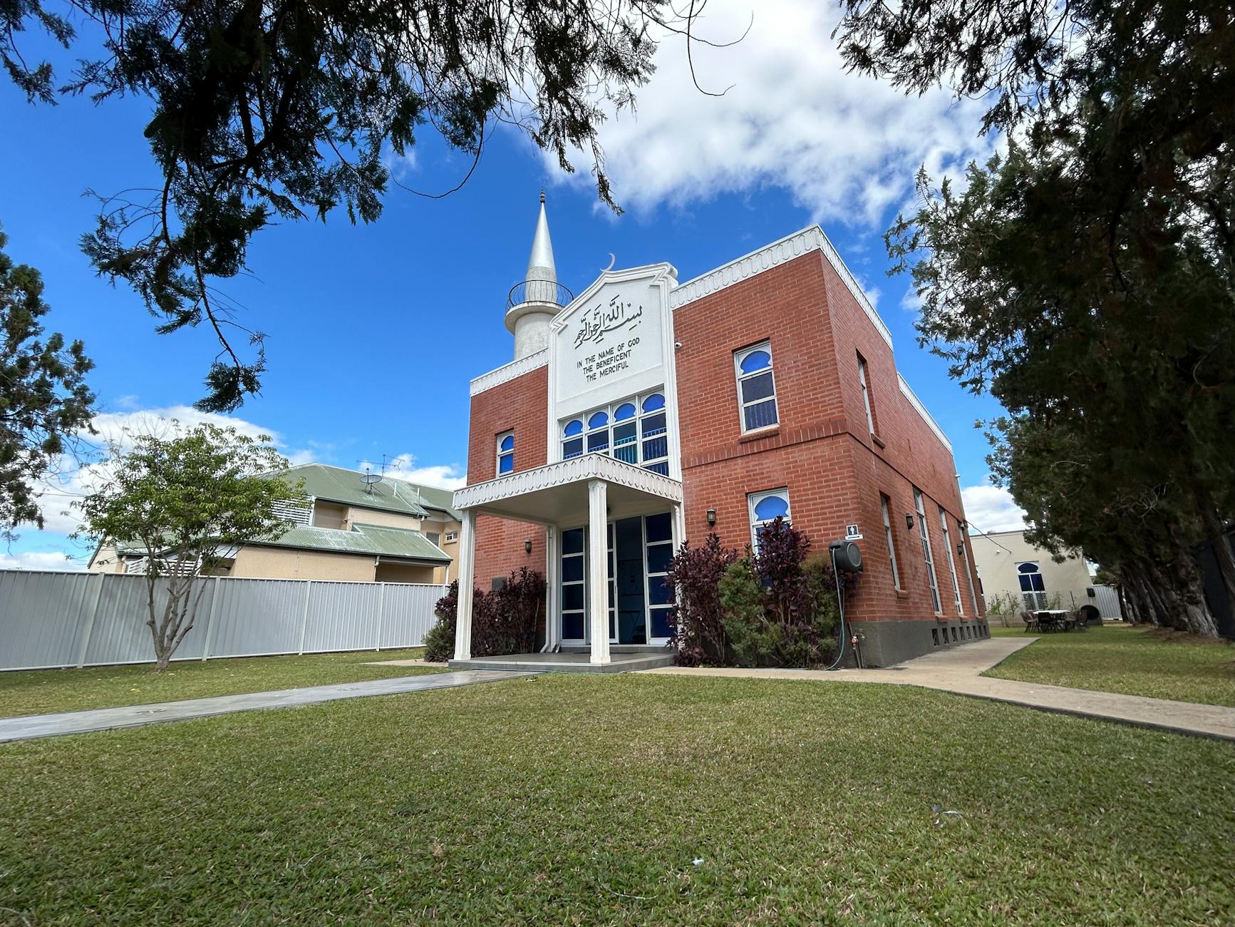 Red brick mosque in Queensland for Brisbane short-term religious travel report planning.