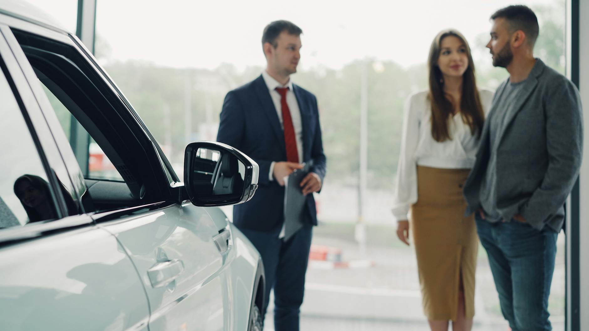Salesperson consulting customers for Brisbane client-call planning.
