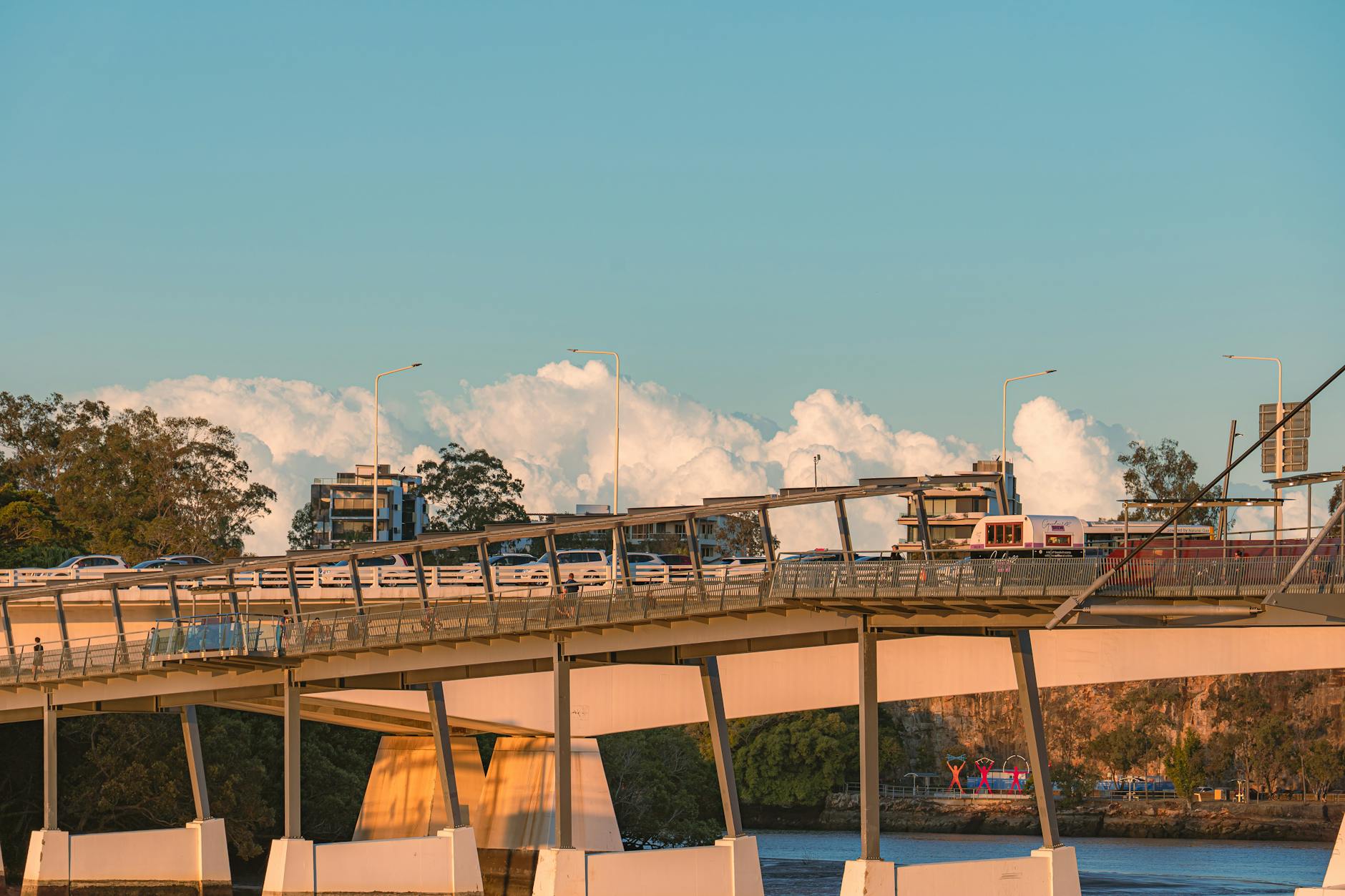 Brisbane bridge and traffic at sunset for solo travel report planning.