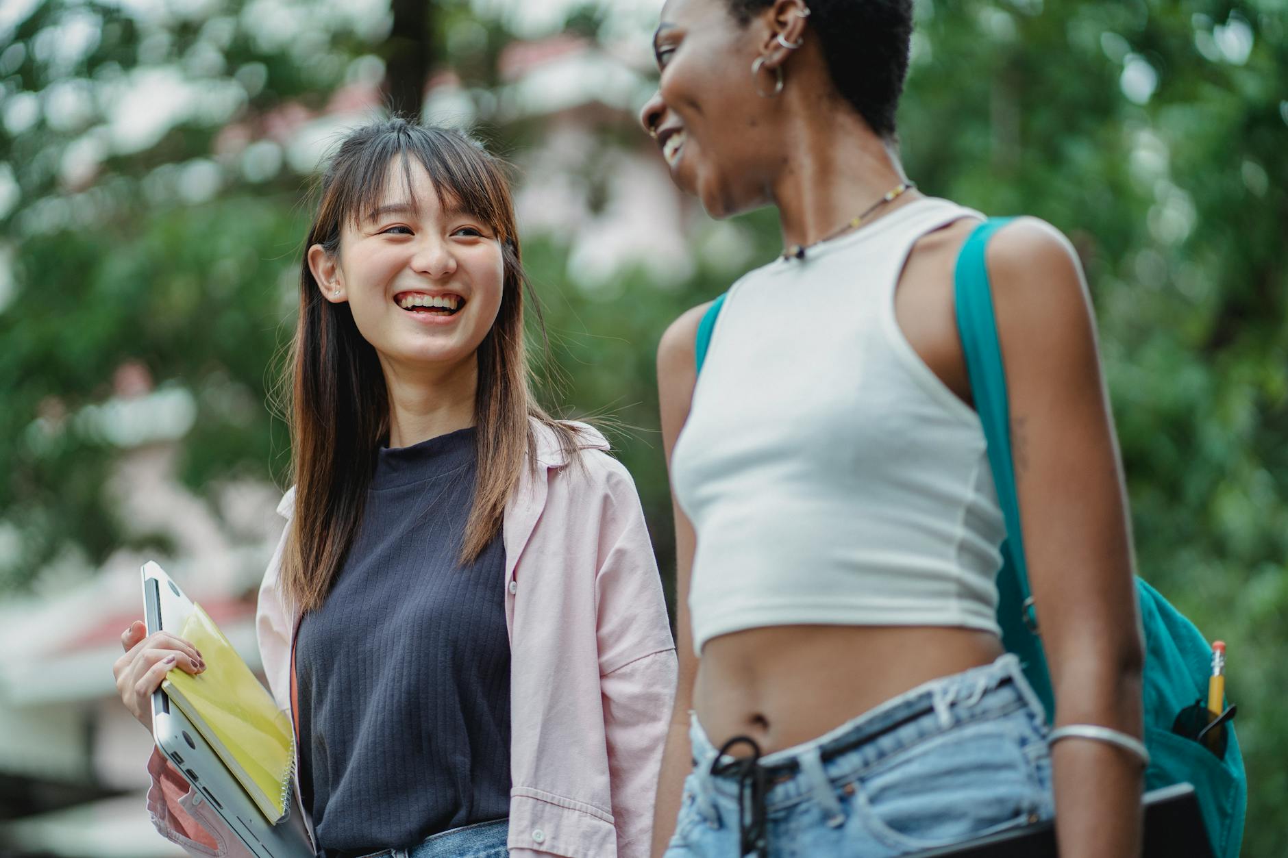 Students walking in a park for Brisbane short-program budget planning.