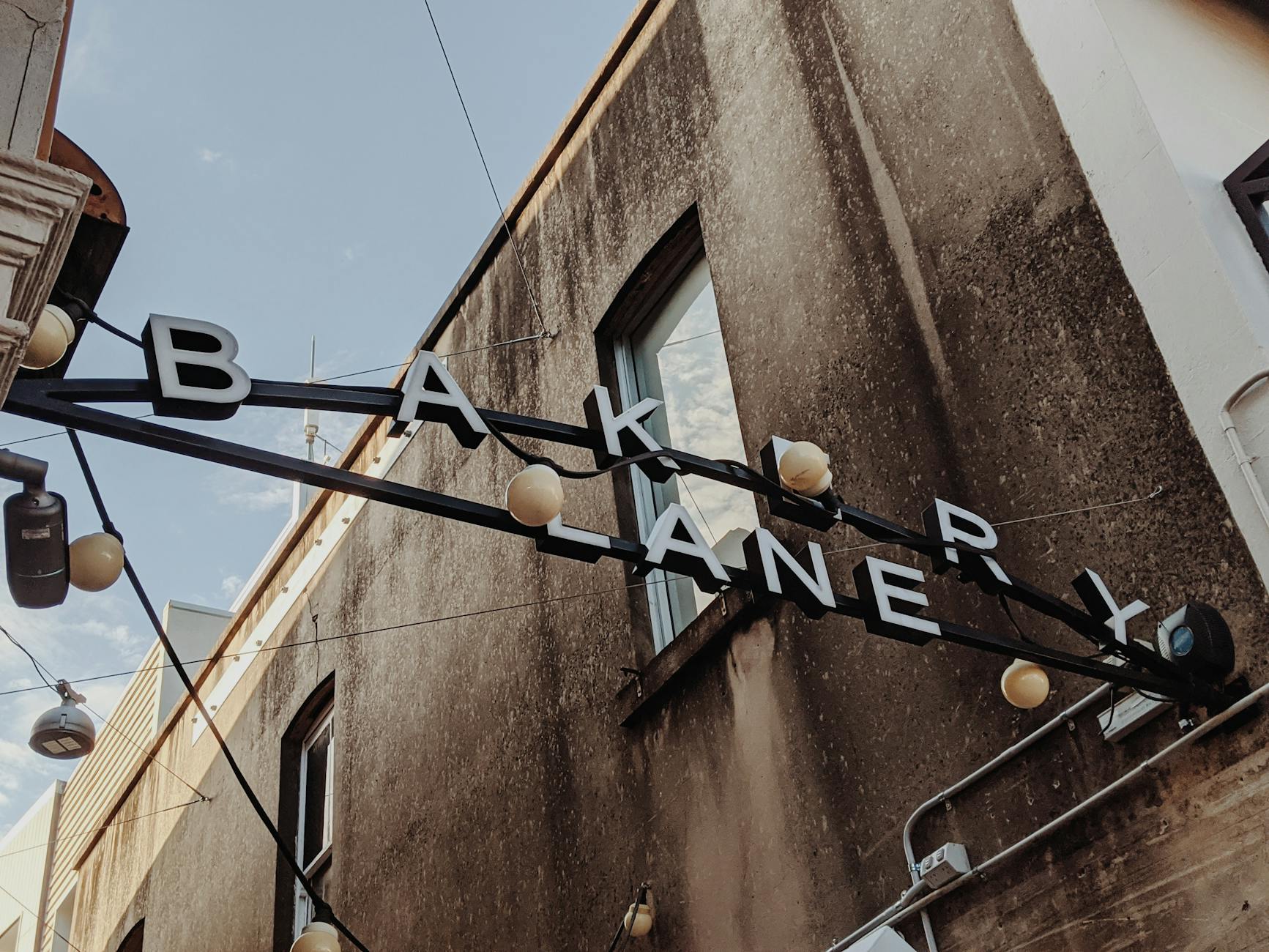 Bakery Lane sign in Brisbane for tourist neighborhood planning.