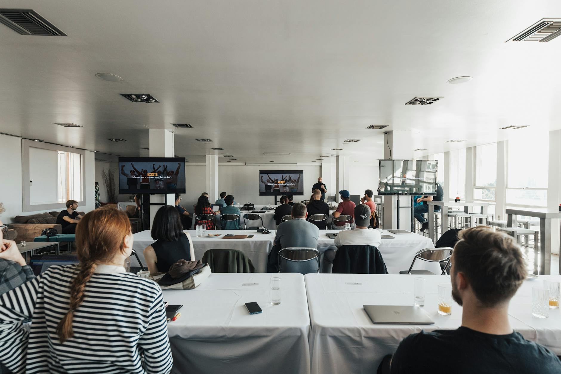 Business conference audience for Brisbane trade-show schedule planning.