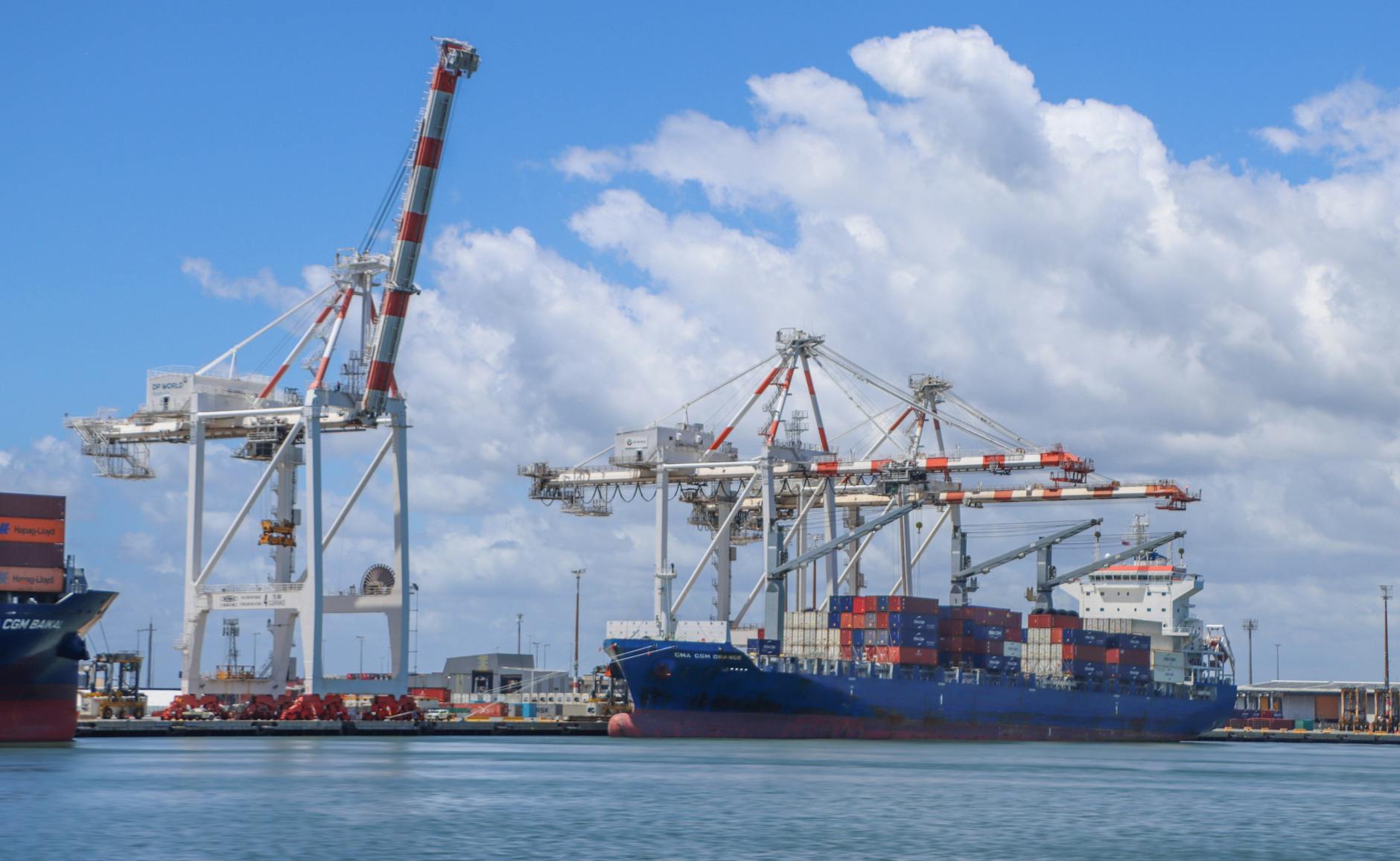 Container ship at the Port of Brisbane for trade-show freight planning.