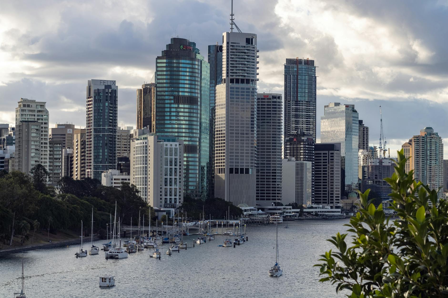 Brisbane skyline and river boats for orientation planning.