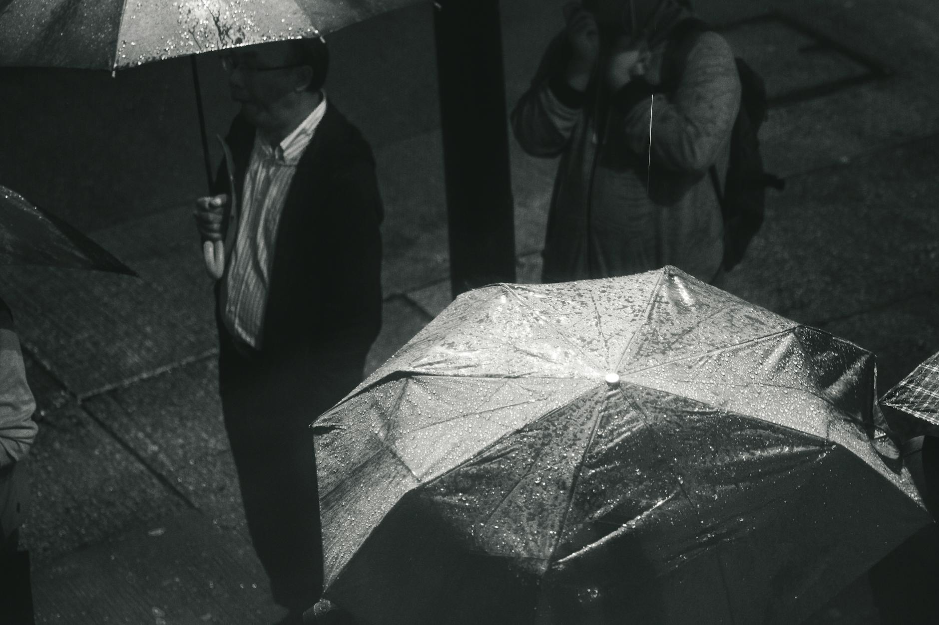 Central Hong Kong rainy street and outdoor traveler planning context.