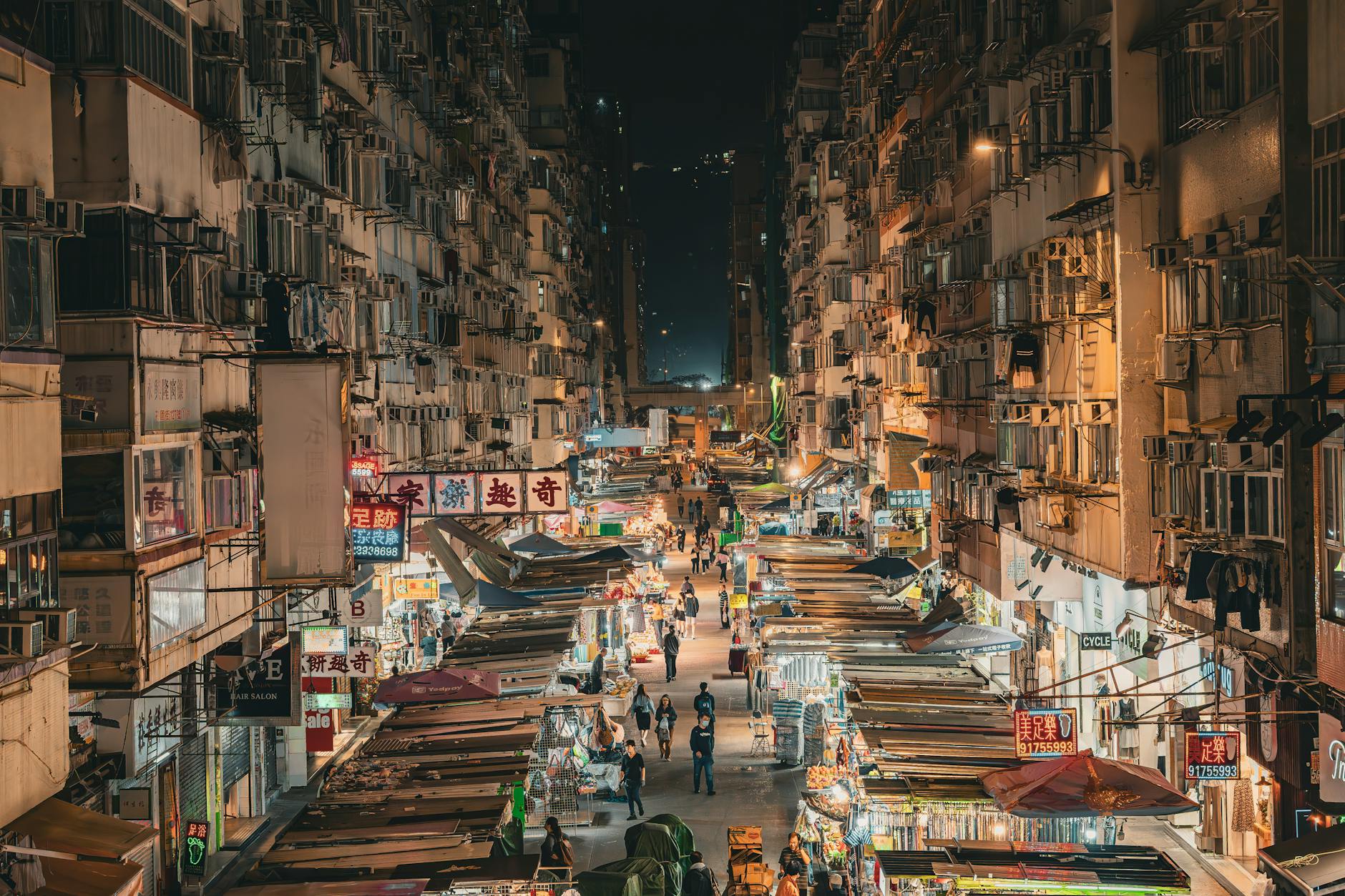 Hong Kong market street and creator production-planning context.