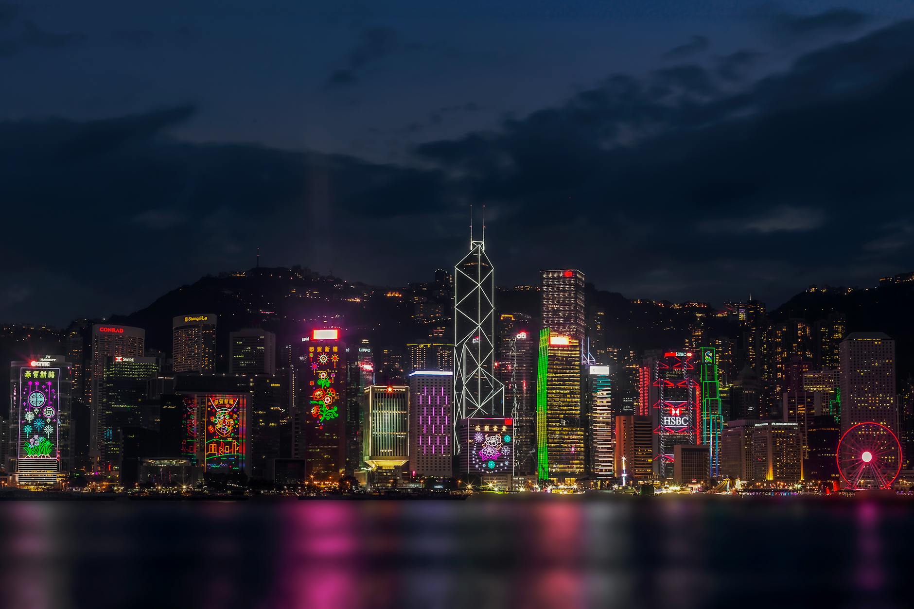 Central Hong Kong night skyline and creator permission planning context.