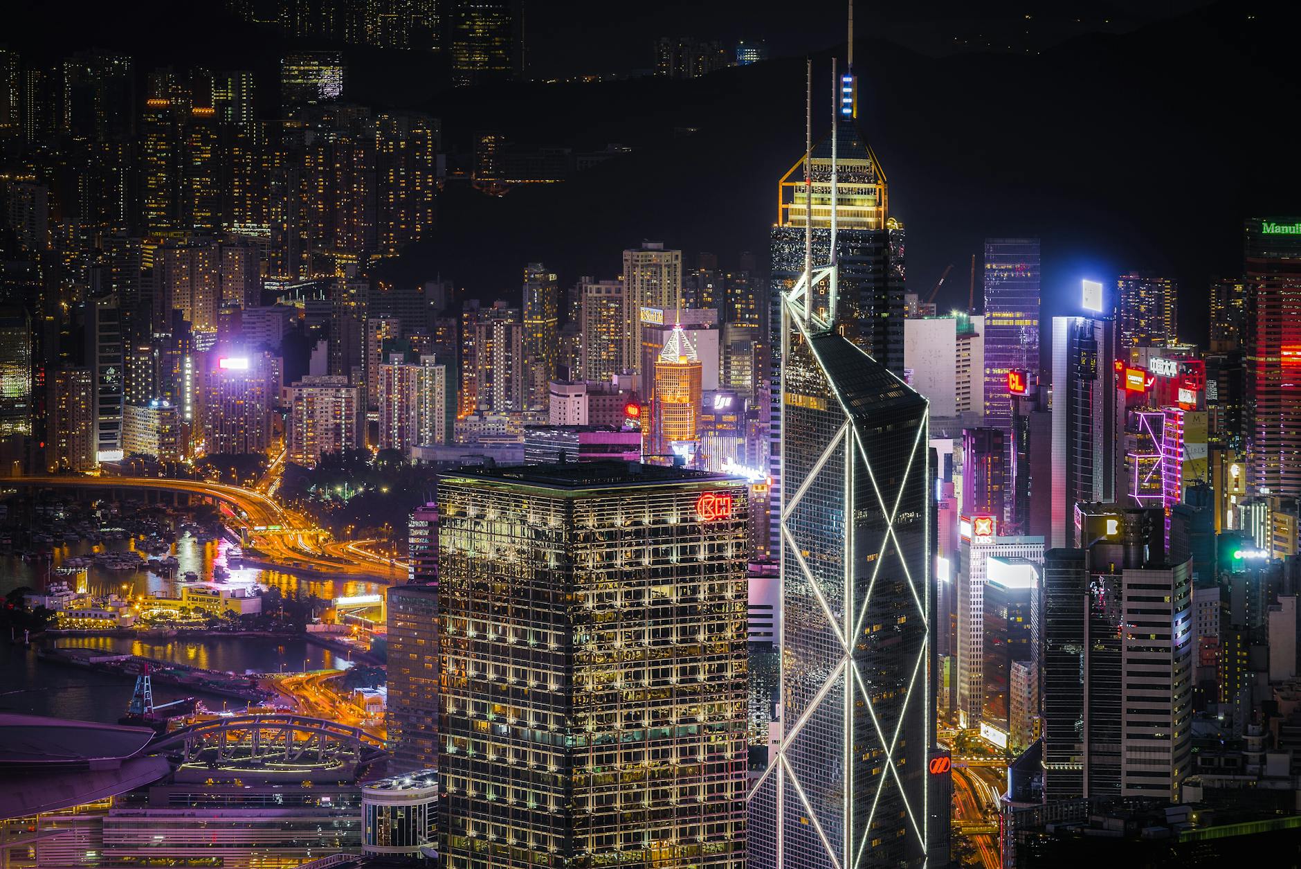 Central Hong Kong night skyline and investor trip planning context.