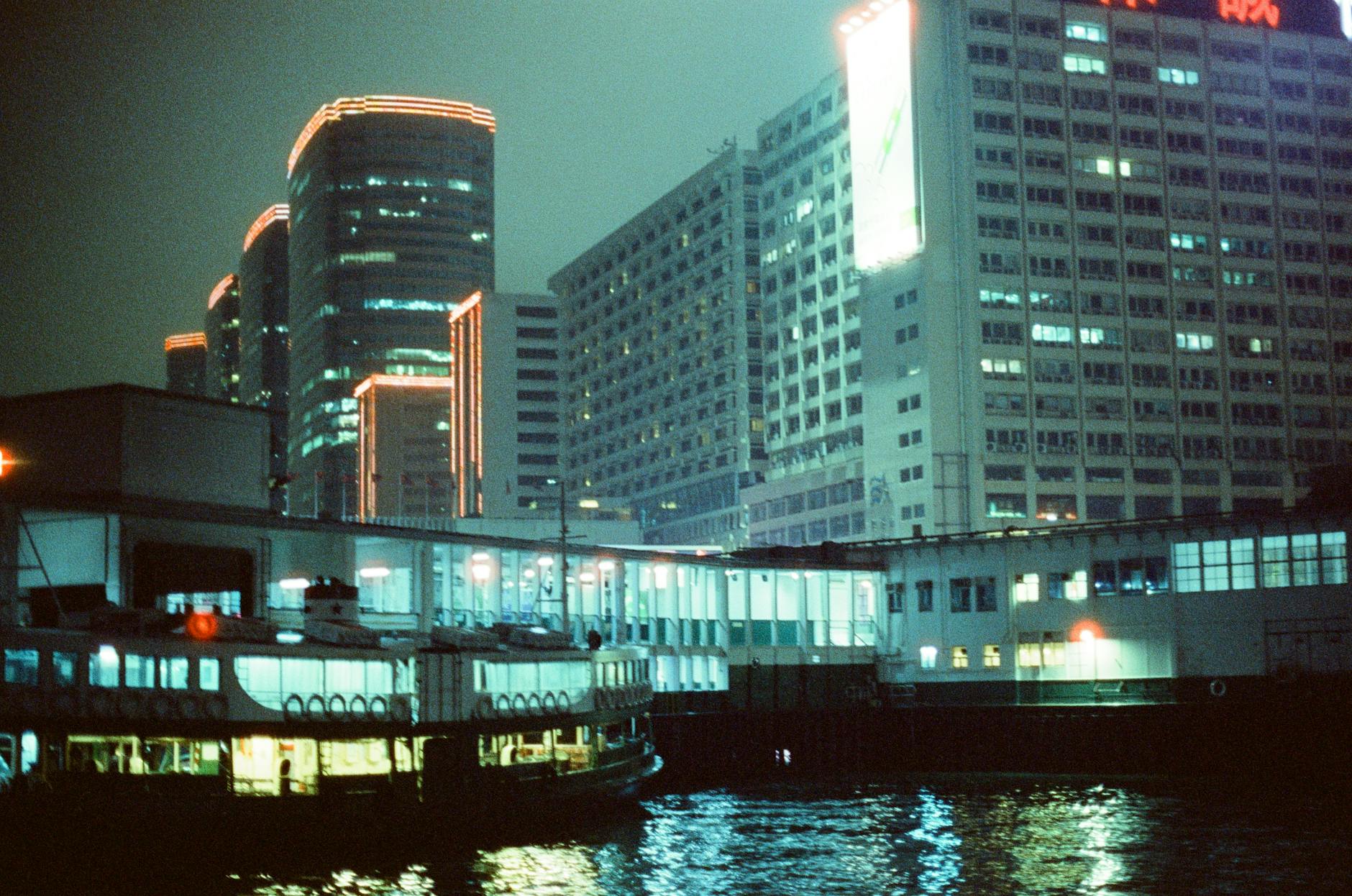 Central Hong Kong night street and journalist trip planning context.