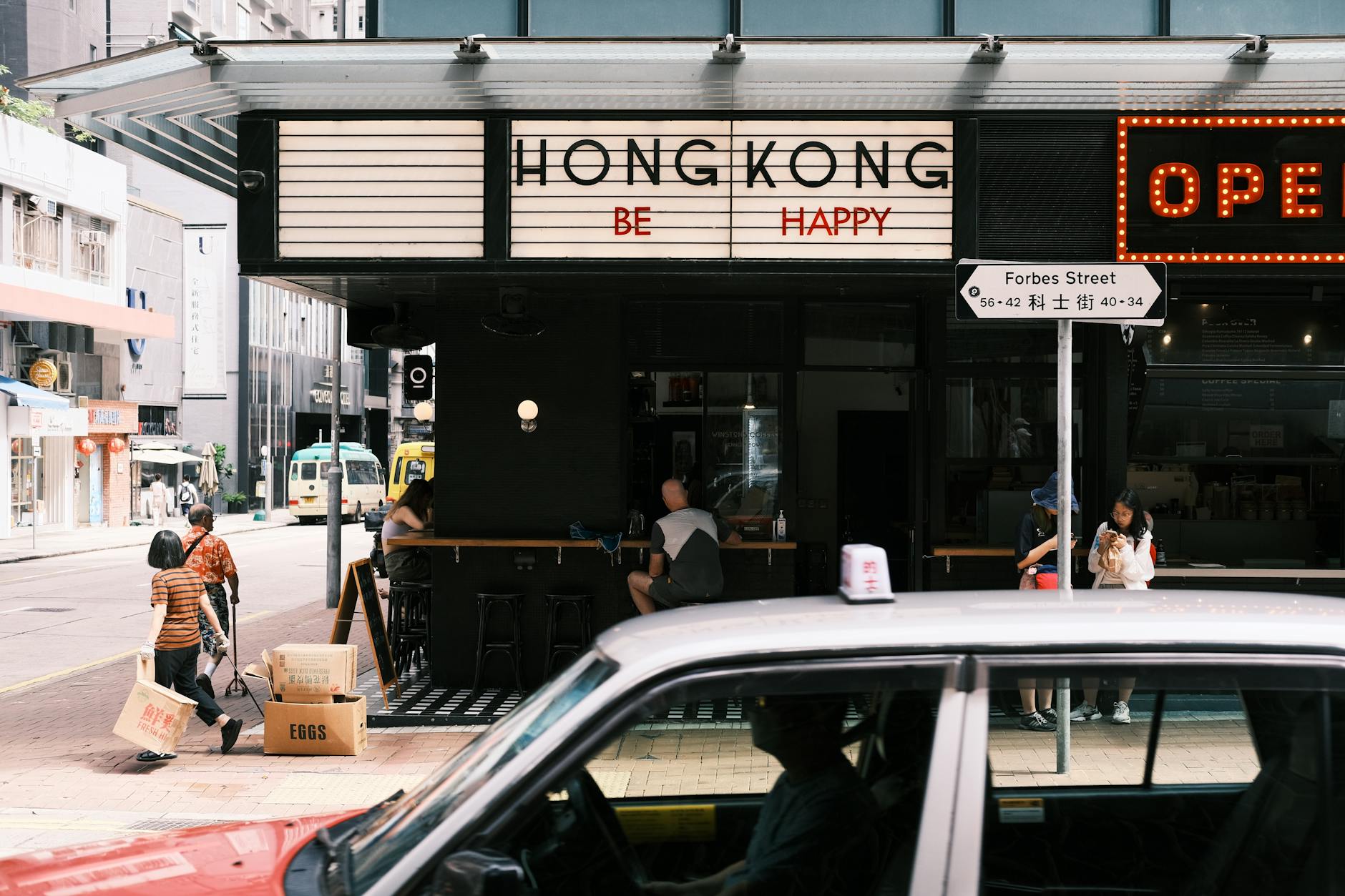 Central Hong Kong cafe and journalist filing-window planning context.
