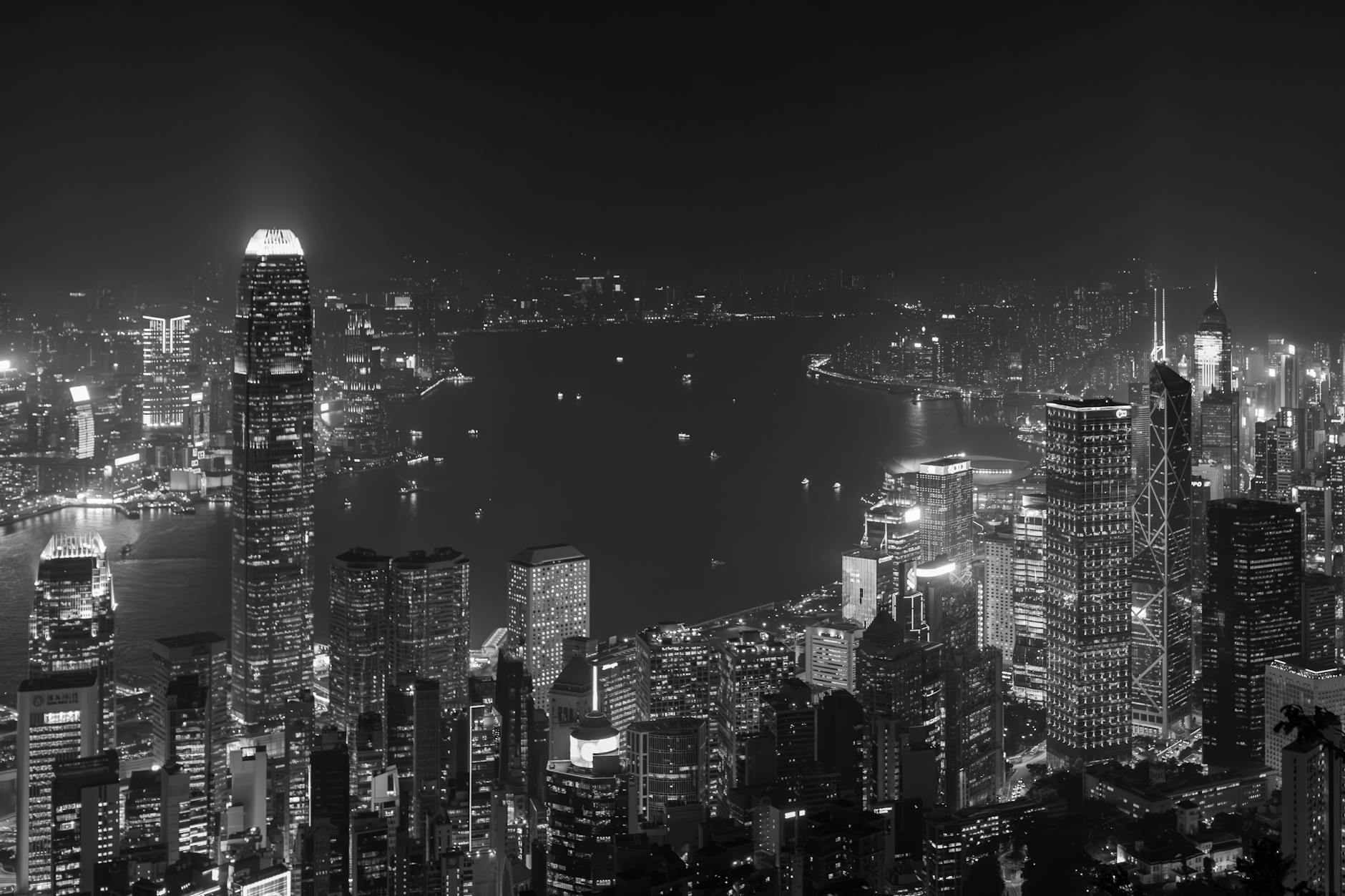 Central Hong Kong night city and religious traveler planning context.