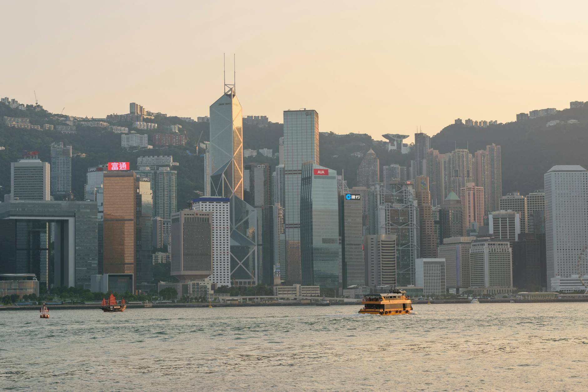 Central Hong Kong tourist skyline and harbor planning context.