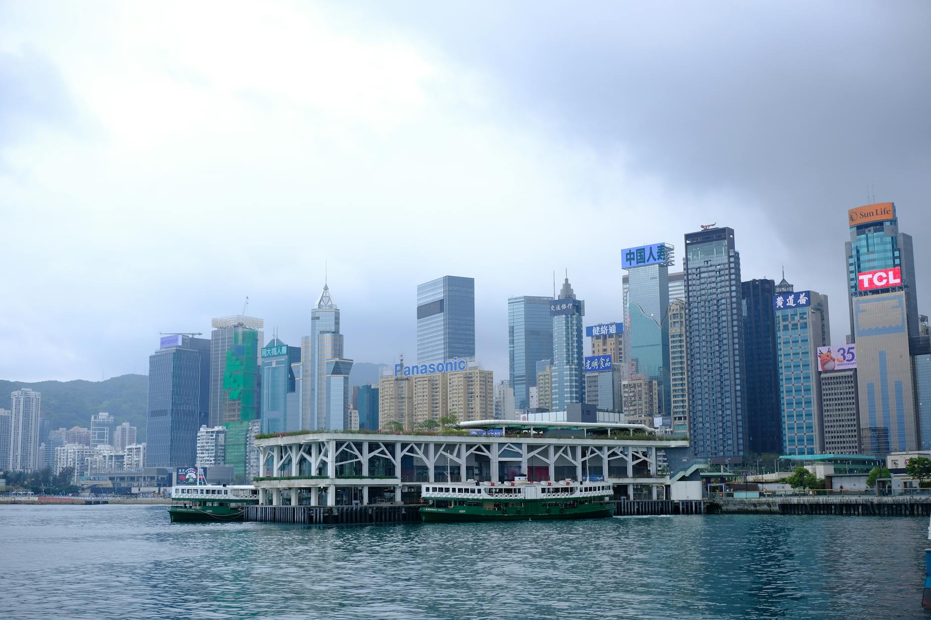 Hong Kong harbor ferry and trade-show client-hosting route context.